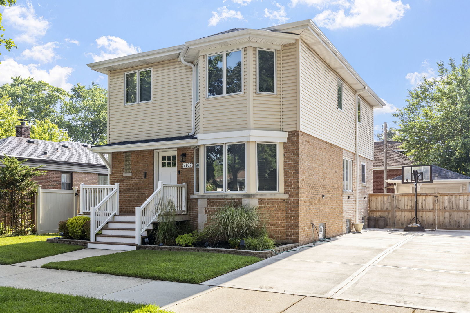 Welcome to 9107 S Hamilton Ave - where thoughtful upgrades meet timeless charm in the heart of Beverly. This nearly 3,000 sq ft home has been extensively updated for modern comfort and peace of mind. Major mechanical improvements include a new roof, gutters, furnace, A/C, and water heater (all 2024). Inside, you'll find remodeled bathrooms on the main and upper levels (2021) and a brand-new basement bathroom (2025). The kitchen features freshly painted cabinets (2025) and updated appliances (2024), while a stylishly remodeled mudroom adds convenience and function. The fully finished basement, also updated in 2025, offers fantastic extra living space. Additional upgrades include a new fence (2022), interior door package (2022), new driveway and patio (2018), and professional landscaping (2018).    This spacious 5-bedroom, 3-bath home offers a highly functional layout ideal for multigenerational living or hosting guests, with three bedrooms upstairs, one on the main level, and one in the basement-each conveniently paired with a full bathroom. The home blends modern finishes with classic character and includes a fenced-in yard, one-car garage, and inviting curb appeal.    Located in the highly desirable Beverly neighborhood, this move-in-ready gem is a rare opportunity to own a beautifully updated home with nearly 3,000 square feet of versatile living space.