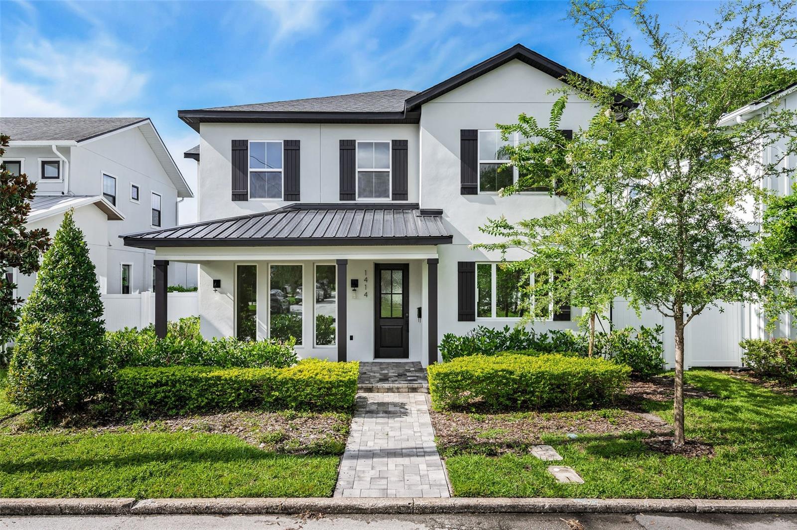 Contemporary style, quality construction, and a coveted College Park location come together in this nearly new home by Parade of Homes award-winning builder Clarkson Concepts. Thoughtfully designed with 10-foot ceilings and an open, airy layout, this two-story residence is filled with natural light and high-end finishes throughout. The kitchen features a large island ideal for entertaining or working from home, while the spacious living areas offer great flow and a seamless connection to the outdoors. Step into the inviting backyard, where a covered porch and fenced yard create a private retreat perfect for relaxing or gathering with friends. The owner’s suite includes vaulted ceilings, a generous walk-in closet, and a stylish en suite bath with a custom glass-enclosed shower. The two additional bedrooms share a well-designed Jack and Jill bath—each with its own private sink—connected by a shared tub and shower. Additional highlights include luxury vinyl flooring, designer lighting, and rustic wood beams in the dining room that add character and charm. Enjoy peace of mind with energy-efficient upgrades such as foam block wall insulation, R-38 roof insulation, and Low-E windows. The rear-entry tandem garage is accessed from a quiet street behind the home, meaning no rear neighbors and even more curb appeal from the front. Located near the vibrant Packing District and all that College Park has to offer, this home is the perfect blend of form, function, and location.