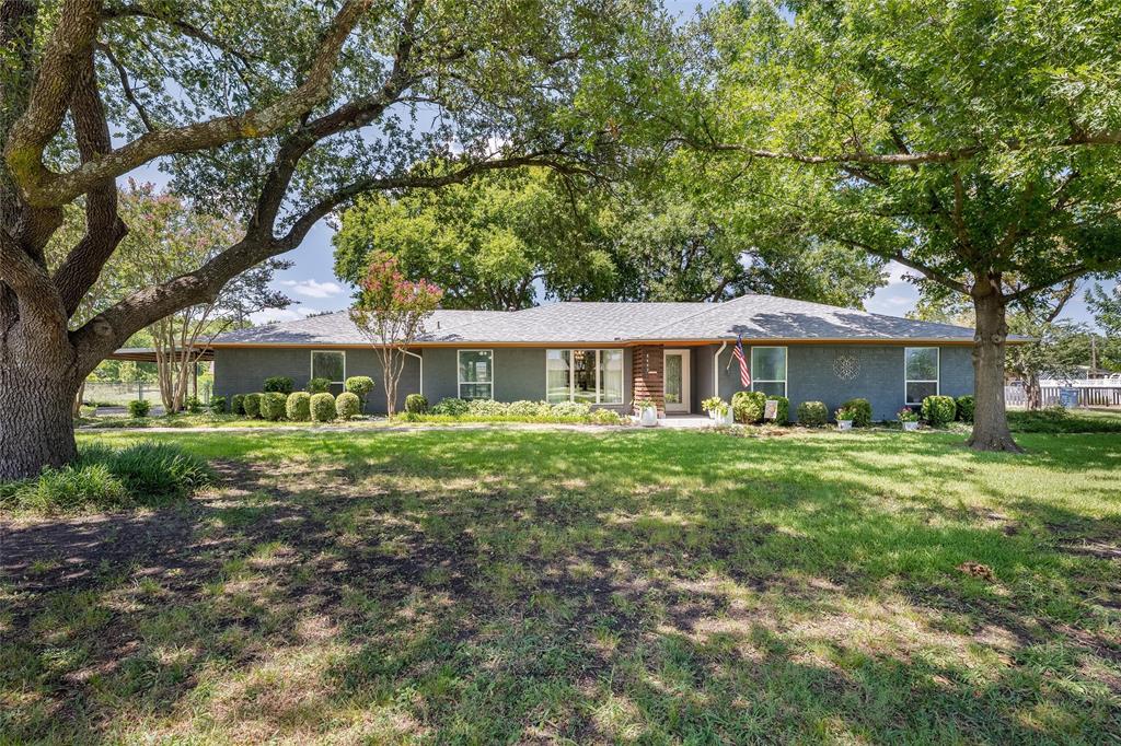 RARE OPPORTUNITY IN PARKER! ONE ACRE • ONE STORY • PLANO ISD • UNDER $530,000!Finding a well-maintained one-story home on a fully fenced 1-acre lot in Parker at this price is almost unheard of! Offering the perfect blend of peaceful country living & everyday convenience, this exceptional property is located in highly sought-after Plano ISD, right on the edge of Allen & Plano, giving you quick access to premier shopping, dining, entertainment & major highways while still enjoying the space & privacy you've been dreaming of. This spacious 2,160-square-foot home features 3 bedrooms, 2 bathrooms & a versatile, converted garage that can serve as a second living area, game room, media room, home office, workout space, or hobby room. An attached carport provides covered parking while maintaining the flexibility of this bonus living space. The heart of the home offers a functional kitchen complete with double built-in ovens, an electric cooktop, a newer dishwasher, and TWO pantries, making meal preparation and storage a breeze. The inviting family room features wood flooring, a wood-burning fireplace & plenty of space to relax after a long day. The remodeled primary suite is a true retreat, featuring separate vanities, a large walk-in shower & two walk-in closets. Step outside & enjoy your own private backyard oasis where there's room to garden, play, entertain, or simply relax under the Texas sky. The gas fire pit on the back deck remains with the home, the beautiful shade trees create the perfect gathering spot for cool evenings with family & friends. You'll appreciate the pride of ownership throughout with numerous updates already completed: NEW Class 4 ROOF, Gutters & leaf guards, Foundation repairs complete, Radiant barrier attic, newer energy-efficient windows & electrical panel. Don't miss your chance to own this incredible Parker property before it's gone! More professional photos coming soon! Schedule your showing before everyone else discovers this hidden gem!