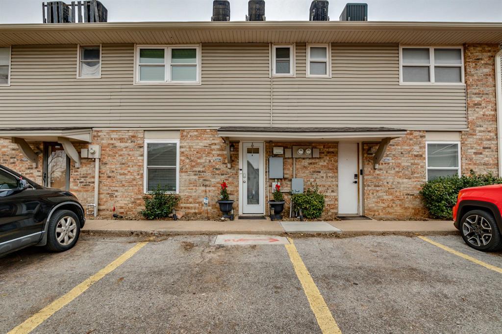 Updated and move-in ready condo with numerous upgrades throughout. Features all new windows and doors, newer carpet, granite countertops with glass subway tile, new cabinetry, and stainless steel appliances with a gas range. Refrigerator stays. Kitchen includes a pantry closet, and the dining area offers durable wood-look tile flooring. Living room features a wood-burning fireplace with electric insert.This home offers 2.5 bathrooms, including an upstairs primary suite with walk-in closet, updated vanities. Convenient upstairs laundry in the bedroom with stackable washer and dryer included. Additional features include built-ins along the staircase, zoned heating.Community amenities include a pool and nearby bike trail access.