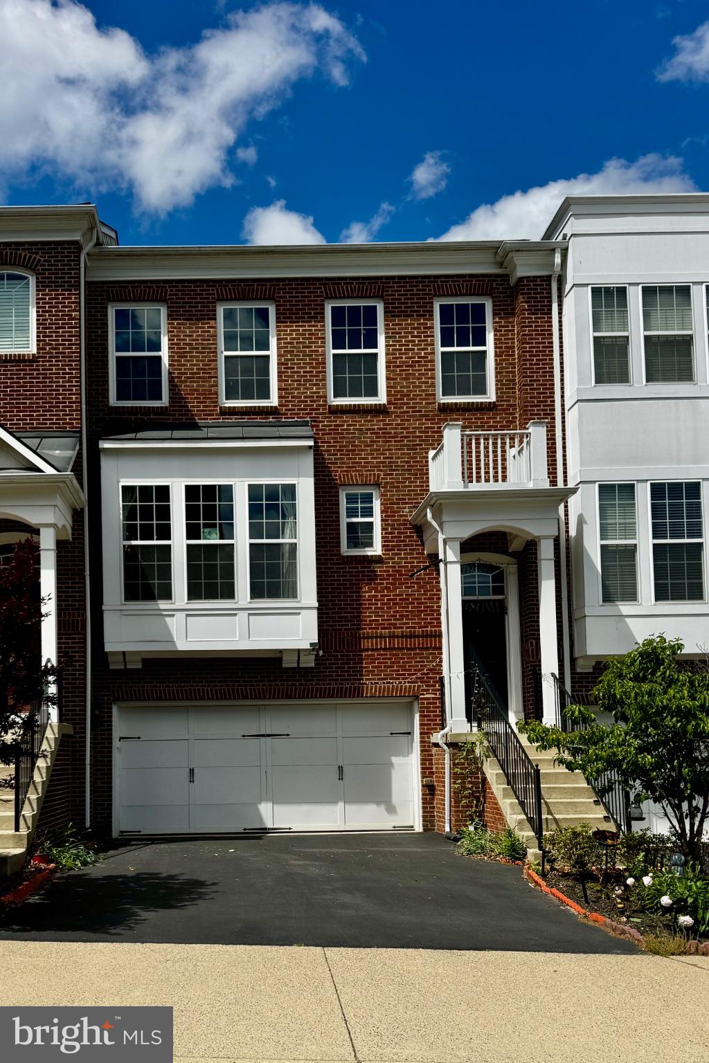 Welcome to this beautifully updated 4-bedroom, 3.5-bath townhome located in the highly sought-after Goose Creek Village community in Ashburn.This east-facing home is filled with natural light throughout the day and offers serene views of a retention pond from the elevated Trex deck—perfect for morning coffee or evening relaxation. Situated on a quiet dead-end street with no homes directly opposite, the setting provides added privacy and a peaceful residential feel.Inside, the home features thoughtful upgrades throughout, including wood and LVP flooring across all levels—even extending into the garage. The main living spaces have been freshly painted, and the sunroom has been recently updated, creating a bright and inviting additional living area.The kitchen is enhanced with a newly installed RO water purification system at the tap, complementing a whole-house water softener and filtration system for added comfort and convenience.Major system updates provide peace of mind, including a brand-new water heater (05/2025) and HVAC heating system replacement (12/2024). A brand-new washer is also included.This home is built for modern living with extensive smart infrastructure: wired internet hubs across all three floors, UniFi network and camera system integration, wired exterior cameras (front door, garage, and rear), and app-based monitoring capabilities. An electric vehicle charging port has been installed (charger unit will be removed, but wiring and plug remain).Additional highlights include:One of the largest driveways in the communityCustom garage storage and upgraded garage flooringBeautifully landscaped front yard (2025) and backyard plant bedsTrex deck with pond viewsGarage refrigerator includedProximity to community park, pool, and additional guest parkingThis home combines modern upgrades, smart-home readiness, and a prime Ashburn location—offering comfort, convenience, and lifestyle in one exceptional package.