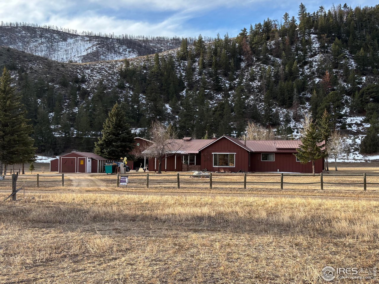 Spectacular setting in upper Poudre Canyon, just west of Glen Echo Resort. 1886 square foot ranch home on 2 +/-- acres, located between the national forest and Poudre river. This 3 bedroom, 2 bath has an open floor plan with vaulted ceilings, a wood burning stove in the living room and a working wood burning stove in the kitchen along with a gas range and built in oven, It also has forced air heat, a nice patio and metal roof along with a 2 car garage, a 10 X 20 storage shed and a 40 X 50 insulated and heated shop with 2 large overhead doors great for parking equipment and campers.