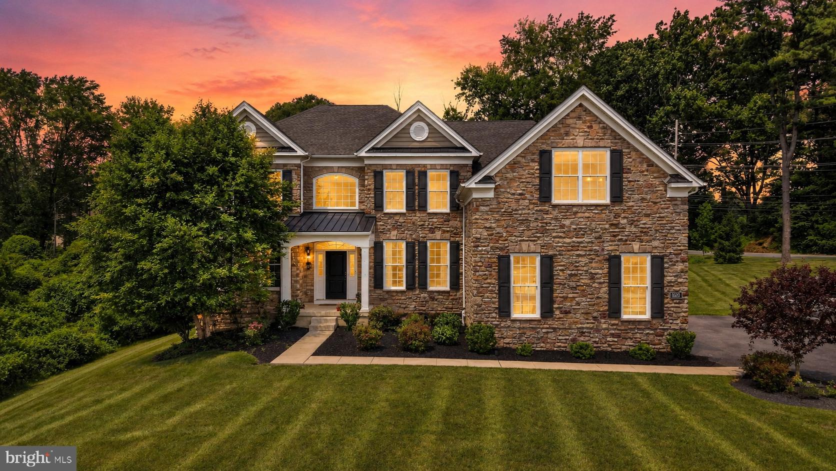 Welcome to this exceptional 5,404 square foot residence, thoughtfully built in 2018 on a spacious 1.16-acre lot in one of Media’s most desirable enclaves. Boasting timeless curb appeal with a striking stone and siding facade, this 4-bedroom, 3.5-bath home offers an ideal blend of luxury, comfort, and functionality for modern living.  Step inside to soaring two-story ceilings, rich hardwood flooring, and an abundance of natural light throughout. The grand foyer leads to formal living and dining areas, while the heart of the home features a gourmet chef’s kitchen with premium appliances, expansive granite countertops, a large center island, and seamless flow to the open-concept family room highlighted by a dramatic stone fireplace — perfect for entertaining and everyday enjoyment.  A standout is the spectacular two-story great room with soaring ceilings, abundant windows framing serene wooded views, and direct access to the expansive rear deck and patio. The main level also includes a private office/den, convenient powder room, and mudroom/laundry access. Upstairs, the primary suite is a true retreat with a luxurious en-suite bath and generous walk-in closet. Three additional bedrooms (one with potential ensuite capabilities) offer ample space, while the upper-level loft/bonus area provides flexible options for a home office, playroom, or additional living space.The finished lower level and walk-out basement expand the living footprint further, while the oversized three-car garage and extensive storage complete the package. Outside, enjoy the private, level-to-gently-sloped backyard, mature landscaping, and the impressive composite deck with pergola-style cover — an entertainer’s dream overlooking the lush, tree-lined setting.  Located in the highly rated Rose Tree Media School District, this home offers easy access to Media’s vibrant borough, parks, dining, and major commuting routes. A rare opportunity to own a nearly new, move-in-ready luxury home in a sought-after community. This is more than a house — it’s a lifestyle. Schedule your private showing today!