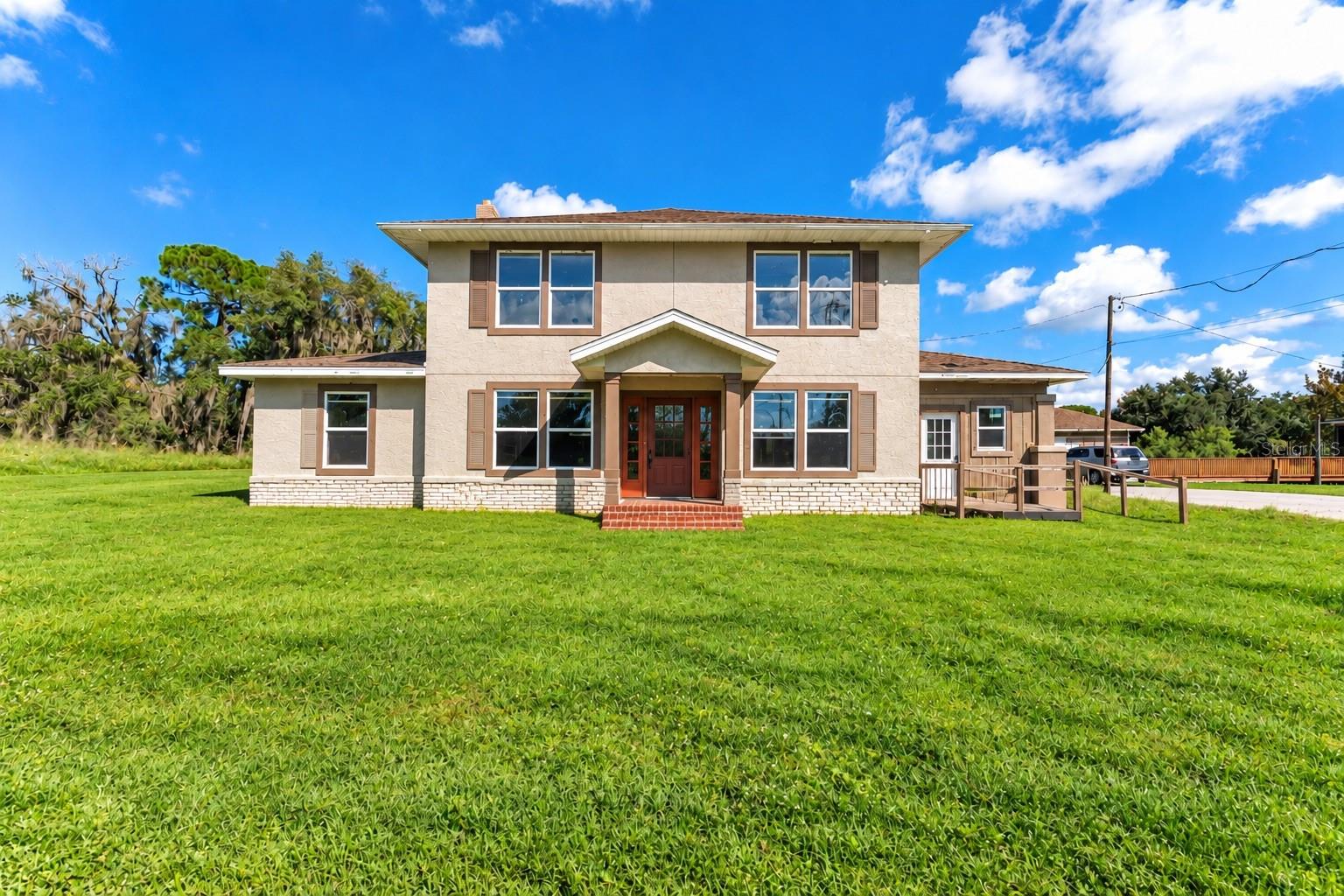 VIRTUALLY STAGED. Own a piece of Sanford history on nearly 1.3 acres of unrestricted land! This historic 2-story fixer-upper offers a rare blend of privacy, space, and opportunity. With no HOA, no deed restrictions, and flexible county zoning. Inside, soaring 9-foot ceilings make every room feel open and airy, giving you the perfect canvas to customize. Upstairs, you’ll find four large rooms and a full bath. Downstairs offers a living room, sunroom, formal dining room, kitchen, second bath, and a versatile laundry/den area. A detached garage provides excellent storage and ample opportunity. Located on rapidly developing Celery Ave this property is positioned for an exciting future. Sold as-is, it’s waiting for a buyer with the vision to restore it to its former glory. Bring your ideas and make history again!!