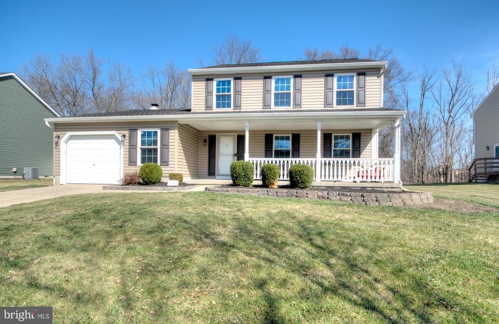 Welcome to this well maintained home nestled in the highly sought-after Marlton Leas neighborhood. From the moment you step onto the welcoming ​covered front ​porch, you will see that this is the home you have been looking for​! This property has undergone substantial upgrades within the past two years, including new vinyl siding, gutters, and a new AC system. The interior features replacement windows, a roomy kitchen with a breakfast nook, and hardwood floors throughout including the staircase and second level. The functional layout flows effortlessly from the living and dining areas into a kitchen that overlooks a family room with a cozy wood-burning fireplace. This space opens to a large, low-maintenance deck and a peaceful backyard, perfect for entertaining year-round. For convenience, the first-floor laundry room connects to an expanded 1.5-car garage. The second level offers a primary bedroom with an ensuite bathroom and backyard views, along with two additional spacious bedrooms and a full bathroom. Meticulously cared for, this home is ideally located just a block away from a neighborhood park featuring a playground, basketball court, and walking trails. Please note that the sellers prefer to sell the home in its current condition and will provide the resale certificate before closing. Schedule your tour today to see everything this lovely home has to offer!