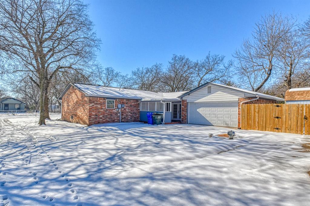 This fully updated home in the heart of Norman offers 2 bedrooms, 2 bathrooms, and a versatile flex room perfect for an additional bedroom, space for hobbies, gaming, or homeschooling ~ The inviting living room features a gas fireplace with built-ins, while the updated kitchen shines with quartz countertops, stainless steel appliances, and modern faucets and fixtures, complemented by a formal dining space ~ Fully updated bathrooms, wood-look vinyl flooring runs throughout the main living spaces and carpet in the bedrooms ~ Fabulous updates include new windows 2022, new hot water tank 2023, 2 car insulated garage door 2024, new electrical panel installed 2022 ~ Practical features include a storm shelter, newer fence, and a large backyard storage shed with electricity—making this home as functional as it stylish ~ Super close to OU, shopping, restaurants, churches, schools, and more! ~ WELCOME HOME!