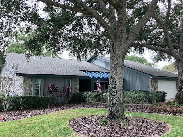 Beautifully updated and thoughtfully maintained, this home offers an impressive combination of major improvements, modern conveniences and Florida lifestyle features. Major updates include a 2020 roof with transferable 10-year warranty, 2021 15-ton inverter-driven 16.25 SEER heat pump system, and hurricane-impact windows and doors installed in 2024. The home also features increased insulation for improved energy efficiency and comfort.The remodeled kitchen features custom cabinetry, concrete countertops and updated appliances, with the dishwasher replaced in 2025. A ZLINE range hood with exterior venting adds both style and functionality. Beautiful prefinished Mullican hardwood flooring with an aluminum oxide finish extends throughout much of the home, while French doors with hurricane glass enhance the bedrooms and living areas. The family room showcases an attractive beamed ceiling.Step outside to enjoy the private pool featuring a PebbleTec finish, updated pool equipment and a variable-speed Pentair pump. The pool cage was replaced in 2017, creating an inviting outdoor space for relaxing and entertaining.Additional highlights include an EVO salt-free water treatment system, Wi-Fi-enabled garage door opener, LED lighting throughout, upgraded rocker-style switches and outlets, newer washer and dryer, and a dual-fuel Firman portable generator with installed electrical connection for emergency power.A long list of meaningful updates means the major work has already been done—allowing you to move in, enjoy the home and focus on the Florida lifestyle. Conveniently located to beaches, the Pinellas Bike trail, major urban centers and two international airports. Don't miss out on this opportunity. Schedule your appointment today.