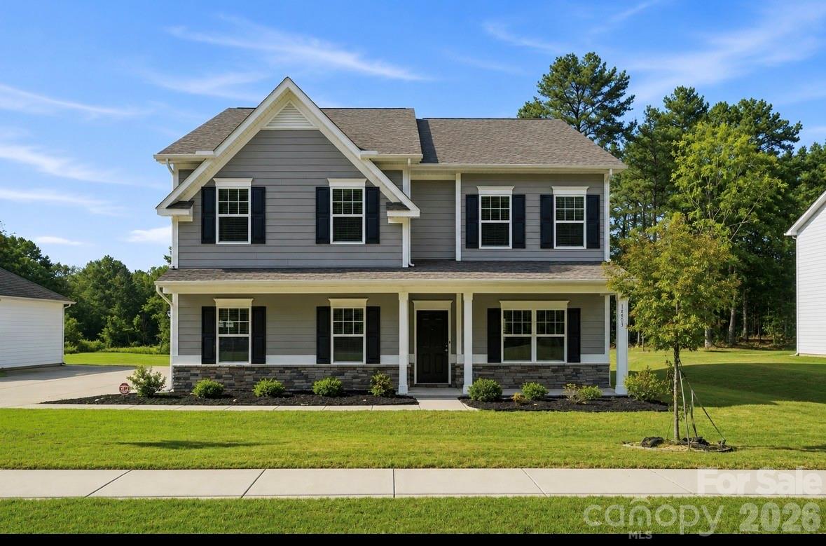 Welcome to 14503 Holbrooks Rd — where space, style, and Huntersville living come together! Located in the highly desirable Vermillion community in Huntersville, NC, this beautifully designed 4-bedroom, 4-bathroom home sits a nearly a half-acre lot and offers the perfect blend of comfort, functionality, and lifestyle.Step inside to an inviting open-concept floor plan designed for both everyday living and effortless entertaining. The spacious kitchen is the heart of the home, featuring a large center island, quartz countertops, abundant cabinetry, walk-in pantry, and butler’s pantry—providing exceptional storage and prep space for everything from casual family meals to large gatherings. The kitchen flows seamlessly into the dining and living areas, creating a bright and connected living space.The main-level bedroom and full bath offer incredible flexibility for guests, a home office, hobbies, or multigenerational living. Upstairs, a generous loft provides additional living space ideal for movie nights, game days, a playroom, home office, or secondary lounge.The spacious primary suite offers a private retreat at the end of the day, complete with a comfortable sitting area and a luxurious ensuite bath featuring a dual vanity. With four bedrooms and four full bathrooms, this home provides the space and versatility today's buyers are looking for.Outside, enjoy the benefits of fully fenced backyard and a 2-car side-load garage that adds convenience, functionality, and curb appeal.Living in Vermillion means enjoying an exceptional community lifestyle with amenities including a resort-style outdoor pool, playground, clubhouse, walking trails, and neighborhood bar & grill. Ideally located in Huntersville, you'll be just minutes from schools, shopping, restaurants, entertainment, I-77, Lake Norman, and an easy drive to Charlotte!This is your opportunity to make this Huntersville home your own—schedule your private showing today!