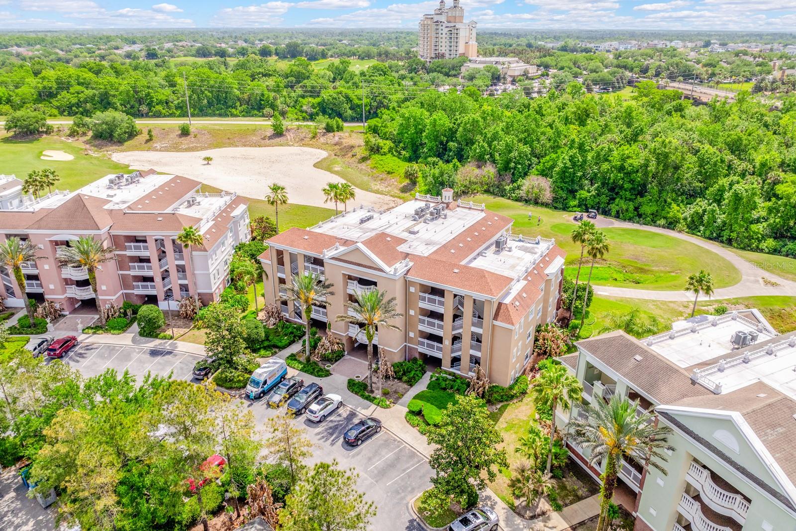 Step into elevated RESORT STYLE LIVING in the GUARD GATED Villas at Reunion Square – where GOLF COURSE VIEWS, modern upgrades, and a truly MOVE-IN READY condition come together in one exceptional second floor unit! Never rented and meticulously maintained, this 3-bedroom, 3-bath residence shows beautifully and is being sold FURNISHED – making it an ideal primary home, vacation retreat, or income-producing SHORT TERM RENTAL. Major updates and improvements have already been taken care of for you: new dishwasher, garbage disposal, and microwave (2023), NEW A/C (2021) with a Nest thermostat (2021), refrigerator (2020), NEW FLOORING THROUGHOUT (2019), and CUSTOM WINDOW SHUTTERS (2019). Additional enhancements include a reconfigured laundry closet to accommodate a FULL SIZE WASHER/DRYER (2017), keyless entry system (2022), plus ongoing maintenance with annual A/C servicing, regular duct cleanings, and quarterly pest monitoring for peace of mind. Fresh paint further enhances the clean, modern feel throughout. Inside, the OPEN CONCEPT layout is filled with natural light and designed for both comfort and functionality, featuring a SPLIT BEDROOM floor plan where each bedroom enjoys its own en-suite bath – perfect for guests or rental flexibility. The living and dining spaces flow seamlessly out to a private BALCONY overlooking the golf course, creating the perfect backdrop for morning coffee or evening relaxation. Located just up the road from the REUNION WATER PARK, this condo offers access to world-class AMENITIES within Reunion Resort, including three championship golf courses designed by Arnold Palmer, Tom Watson, and Jack Nicklaus, multiple resort-style pools, on-site dining options, and a must see water park with a lazy river and water slide. All of this just minutes from Walt Disney World, major highways, shopping, dining, and everything else Central Florida has to offer! LOW MAINTENANCE, lock-and-leave living meets an unbeatable location and lifestyle – this is the one you have been waiting for. Call today to schedule your tour!