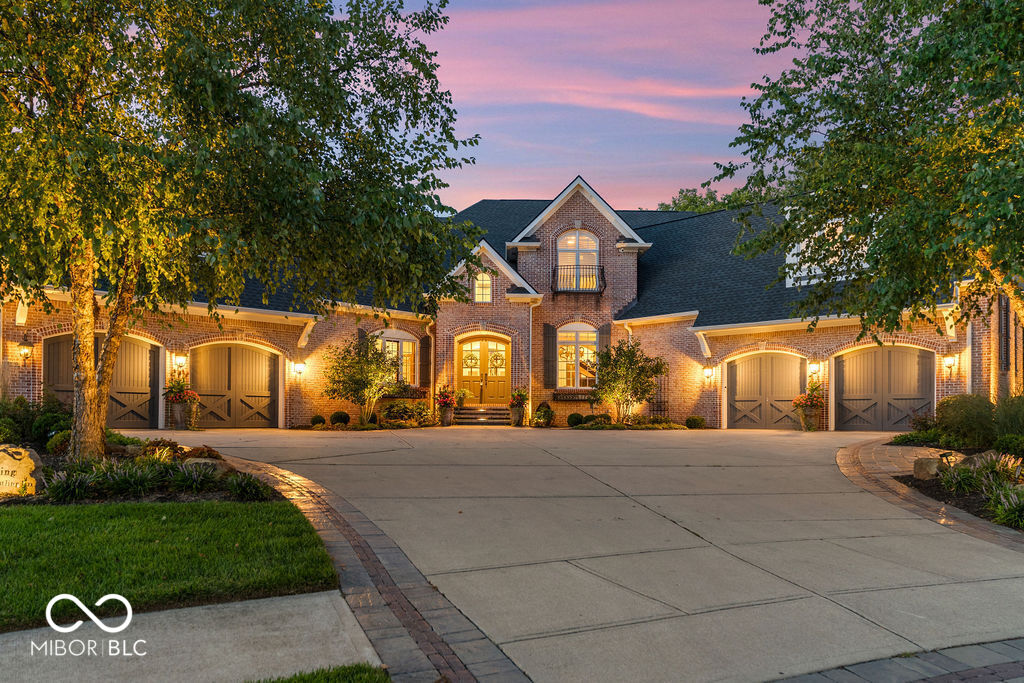 Private "Double" Gated Whistling Straits section of The Bridgewater Club with Incredible panoramic views of hole #14! Stunning custom built home features 7 bedrooms / Bonus Room / 4 fireplaces / Family Room w/ Large Windows and custom Remote Controlled Blinds. Kitchen / Hearth Room / Breakfast Room that is exquisite! This home is loaded w/custom features galore! Amazing walk-out lower level w/Theater, Exercise Room, Billiards Room, Game Room, full Kitchen / Breakfast, 2 Guest Suites w/full Bath and 5.5 total baths. Patio w/firepit/conversation area w/stunning views! Luxurious Main Level Master Retreat w/fireplace & spa-like bath. The best practice facility and amenities galore in Indiana. Very well maintained with new paint inside/out plus ROOF and 3 HVAC systems installed in last 5 years. Lot of other features including Large Storage Area and finished garage floors with one garage having a 20 ft ceiling and full separate HVAC system!  Home boasts a Ton of technology controls with speaker system throughout.