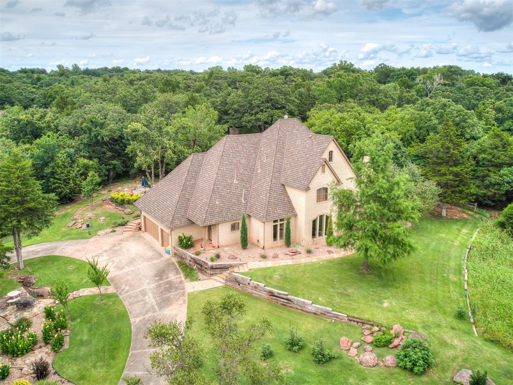 Stunning 3.5-Acre Estate with Pool, Bonus Room, Office & Outdoor Kitchen in Canaan Creek Farms – Edmond, OK

Welcome to your private retreat in the sought-after Canaan Creek Farms community! Nestled on 3.5 acres of beautifully manicured land, just East of I-35 off Coffee Creek and Air Depot, this extraordinary 4-bedroom, 3.5-bath home offers the perfect blend of luxury, comfort, and outdoor living.

With approximately 3,800 square feet of elegant living space, this home features an open-concept floor plan with multiple living areas designed for both relaxation and entertaining. The gourmet kitchen boasts high-end finishes and plenty of counter space, while a dedicated office provides a peaceful space for work or study.

Upstairs, the expansive bonus room offers versatility — whether you envision it as a game room, home theater, or a space for your personal hobbies. The spacious primary suite serves as your own private retreat, with two additional bedrooms offering ample space for family or guests.

Step outside and discover your own backyard paradise! The covered patio features a fully-equipped outdoor kitchen, perfect for grilling, dining, and entertaining al fresco. The sparkling in-ground pool completes this outdoor oasis, offering a refreshing escape with beautiful views. Additionally, a picturesque pond sits catty-corner from the property, enhancing the peaceful setting while still providing convenient access to Edmond's best amenities.

This home is the epitome of luxurious acreage living, combining the tranquility of country life with the comforts of modern design. Don’t miss the chance to make this stunning property your own!
