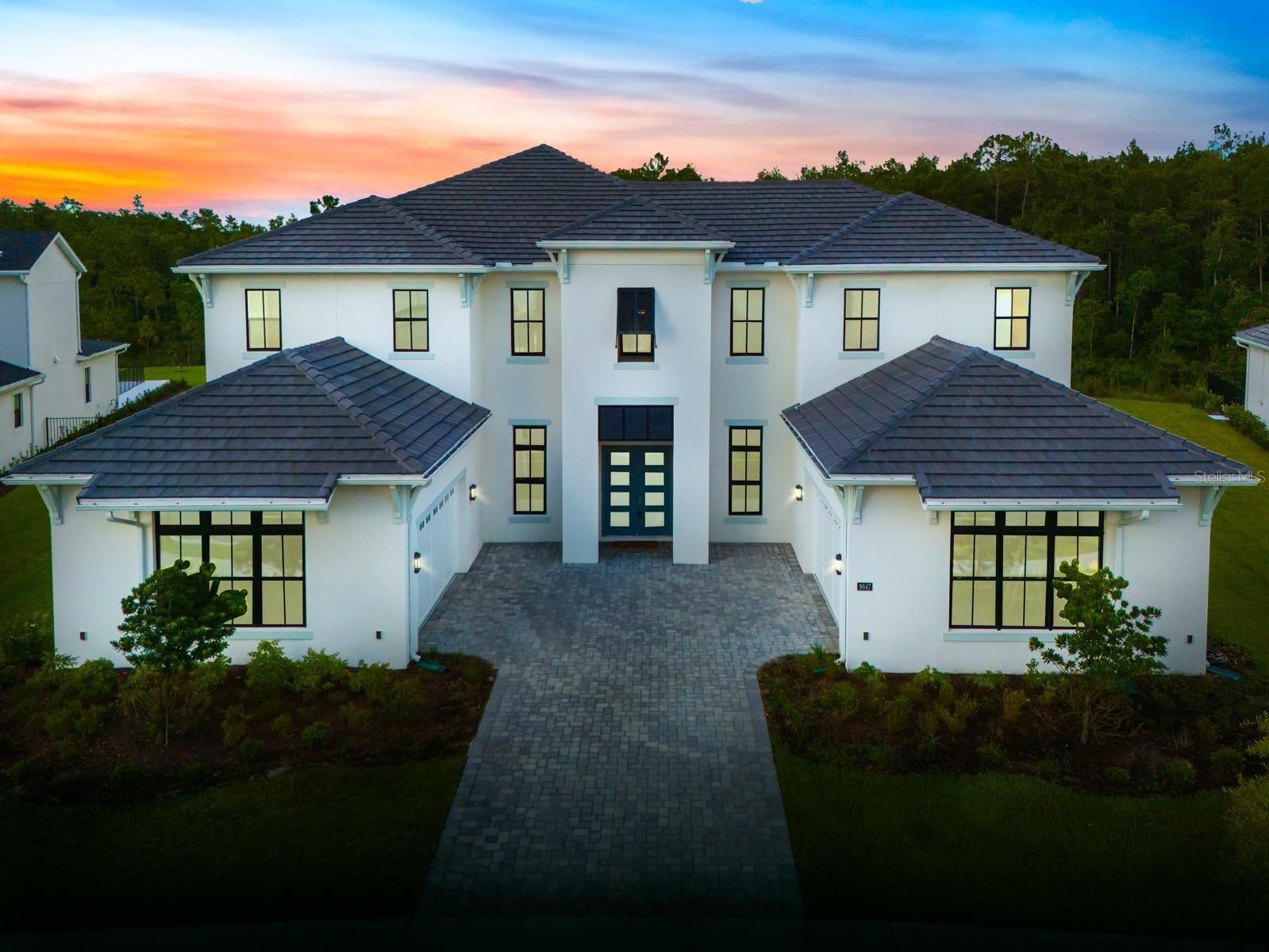 One or more photo(s) has been virtually staged. Price below appraisal value. Welcome to this exceptional home in the prestigious Laurel Pointe community of Lake Nona, set on the largest lot in the neighborhood—a stunning .69-acre estate that offers unparalleled privacy. This sprawling property features 7,093 sq. ft. of living space with 6 spacious bedrooms and 6.5 luxurious bathrooms.
Upon entering, you'll be greeted by high ceilings and an open-concept floor plan, creating an inviting and spacious atmosphere. The gourmet kitchen is a standout, with marble countertops, top-of-the-line appliances, and a large central island, ideal for entertaining. The rooms are also equipped with a vacuum system, providing added convenience for easy clean-up.
The master suite is a true retreat, offering a tranquil escape with its expansive layout, dual vanity areas, freestanding bathtub, and a walk-in glass-enclosed shower.
Enjoy the Florida lifestyle with two outdoor patio areas, perfect for relaxing or hosting gatherings under the stars, all set within meticulously landscaped grounds.
Additional highlights include two attached garages, each with room for two cars, providing ample storage space. This home is located within Lake Nona, known for its healthcare, technology, and wellness focus, and offers access to miles of scenic trails, lush parks, and top-rated amenities.
Minutes from Lake Nona Medical City, the VA Hospital, and major highways, you're also just a short drive from Orlando International Airport, theme parks, and Florida’s beautiful beaches. Experience the luxury and innovation that this exceptional property offers.