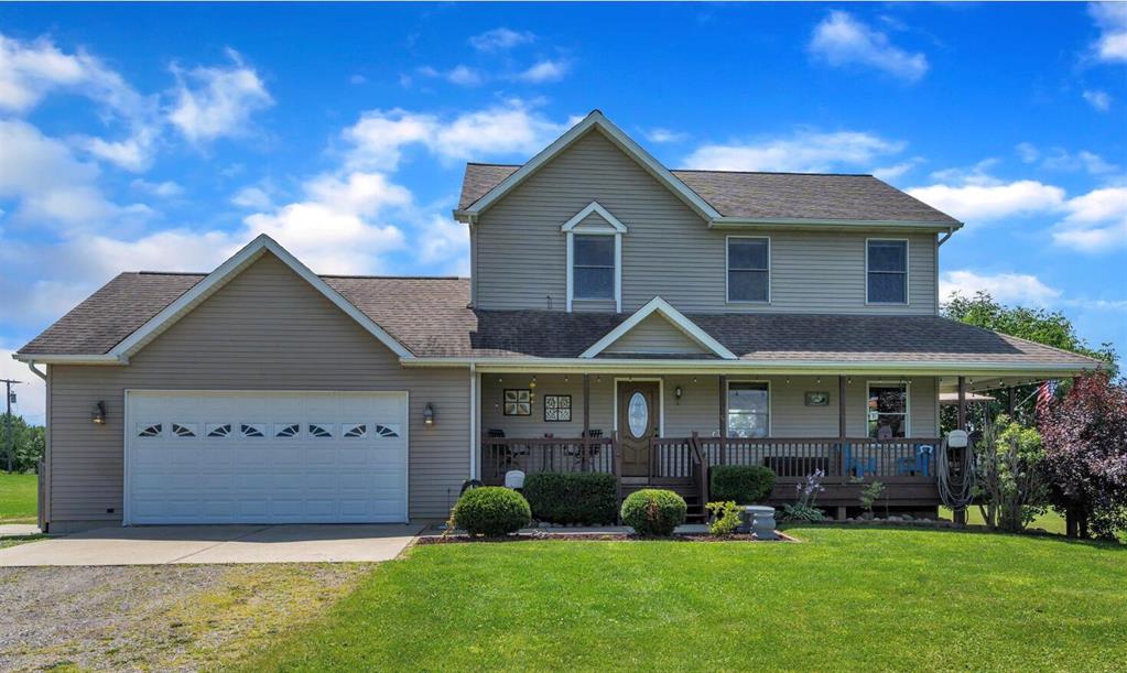 Welcome to 4810 Colby Rd in Perry! This beautiful two-story home features 3 spacious bedrooms and 3.5 bathrooms, set on over 5 acres in a country setting. The home welcomes you with great curb appeal, mature landscaping, and a covered wrap-around porch--perfect for relaxing evenings. Inside, the foyer offers ceramic tile flooring and leads into a well-appointed kitchen with oak cabinetry, ample counter space, an eat-at peninsula, pantry, and stainless steel appliances that stay. The dining area includes a sliding glass door to the back deck and partially fenced yard. The main level also offers a large cozy living room, a half bath, and a laundry/mudroom with access to the attached, two-car garage. Upstairs features two large bedrooms, a full bath, and a primary suite with a walk-in closet and private bath. The finished walk-out basement is ideal for entertaining, complete with a bar area, rec room, and full bath.