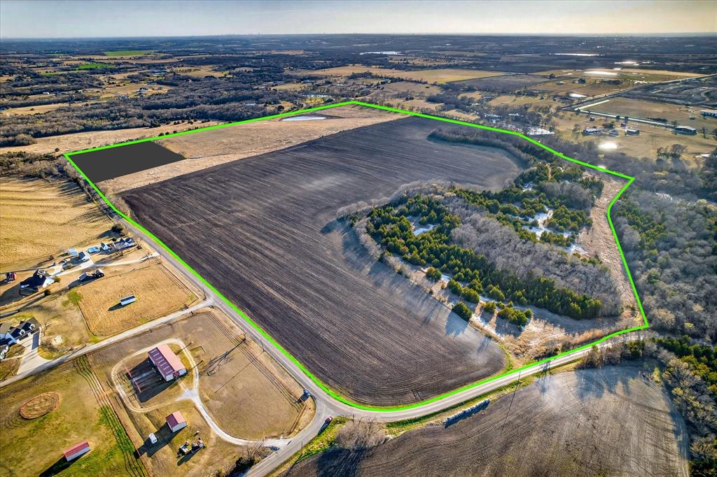 GREAT SWEEP OF ROLLING HILLS, VAST VIEWS, WHITE ROCK OUTCROPPING AMONG TREES ALONG AREA LEADING TO THE CREEK! OVER HALF MILE ROAD FRONTAGE ON EDEN RIDGE ROAD! PLUS OVER 700' FRONTAGE ON FM 455! This land is beautiful! Water Tower of Van Alstyne is visible from this hillside and when you drive south on FM3356 to FM 455, this hillside is visible for several miles! The Butterfield Stage used to come right past this land in the 1800s! Texas History at its finest! Rare treat just to enjoy the views and feel the atmosphere where early settlers traveled to bring to life the Texas we all now enjoy. The East Fork of the Trinity is about half a mile away where the bridge is being rebuilt for easier travel. Just think, the stagecoaches had to ford the river! Come see for yourself!