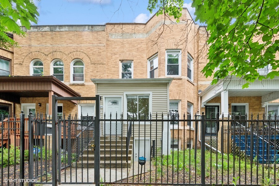 Step into this beautifully remodeled two-story residence nestled in the heart of Bronzeville, an exceptional value that won't last long! This spacious 4bed/4bath home has been thoughtfully updated with modern amenities while preserving its classic charm. Upon entering, you'll be greeted with an open floor plan on the main level, perfect for both relaxing and entertaining. The heart of the home is the gourmet eat-in kitchen, boasting a large island, sleek stainless steel appliances, elegant granite countertops, and ample storage with 42-inch white shaker cabinets complimented by a stylish glass backsplash. Luxurious touches throughout, including refinished walnut hardwood flooring that flows seamlessly throughout the main level, energy-efficient windows, and dual heating and cooling systems ensuring year-round comfort. The private primary bedroom suite is a true retreat, featuring a generous walk-in closet and a glamorous en-suite bath complete with a relaxing jacuzzi tub. The fully finished walkout basement expands the living space with a comfortable family room, laundry area, and a fourth bedroom. The location is unbeatable, with proximity to numerous new developments, easy access to the 90/94 expressway and Lake Shore Drive. This is an incredible opportunity to own a meticulously renovated home in a vibrant and historically rich community.