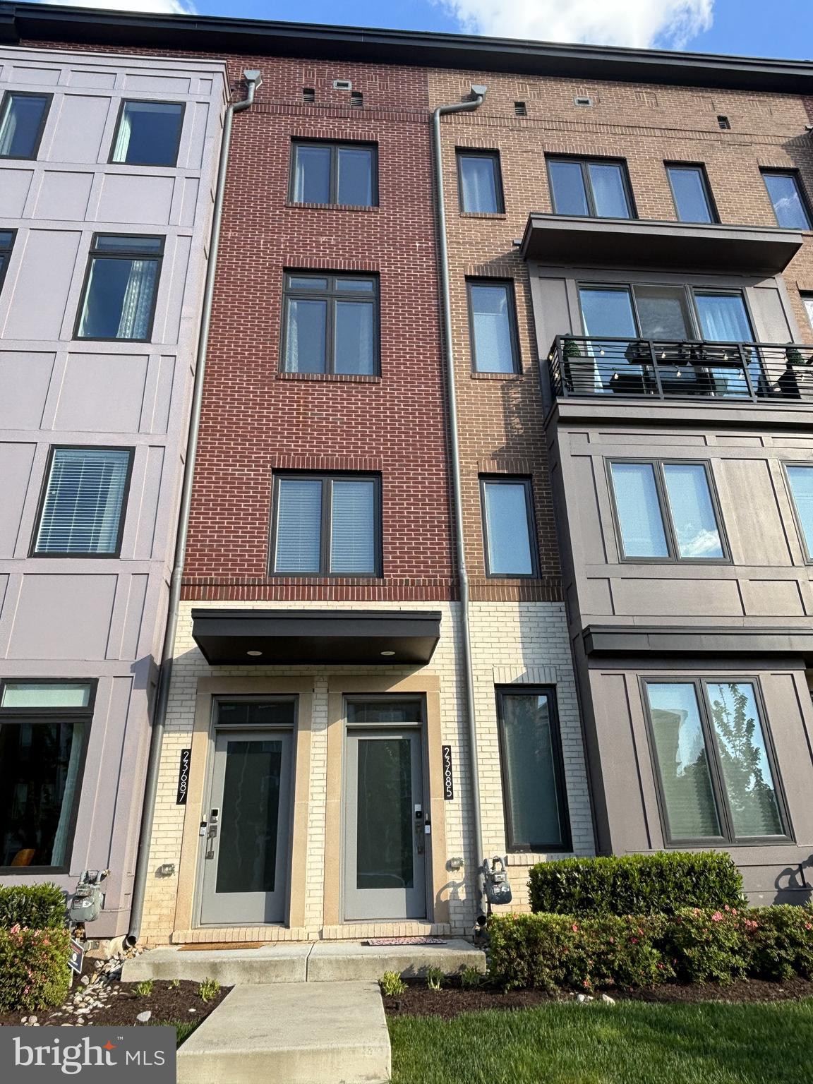 Welcome to one of the best values in Ashburn! This stunning luxury townhouse-style condo, built by Toll Brothers, is ideally located in the heart of Ashburn.With over 2,700 square feet across three thoughtfully designed levels, this home offers an open-concept layout complemented by peaceful tree views. It features three spacious bedrooms, two full bathrooms, one half bath, and a versatile main-level study—ideal for working from home. The primary suite is a standout, featuring dual walk-in closets with custom shelving for optimal organization.The gourmet kitchen is a true centerpiece, showcasing an oversized island, walk-in pantry, and modern finishes—ideal for both everyday living and entertaining. Enjoy outdoor living on the rear balcony or host unforgettable gatherings on the spacious rooftop terrace.Additional highlights include a 1-car garage and access to Loudoun Valley’s exceptional amenities, including a pool, clubhouse, fitness center, tot lots/playgrounds, and scenic walking and jogging trails.Conveniently located just minutes from Ashburn Metro Station, Brambleton Town Center, One Loudoun, and Washington Dulles International Airport.This exceptional home offers the perfect blend of space, style, and location—don’t miss your opportunity to make it yours.