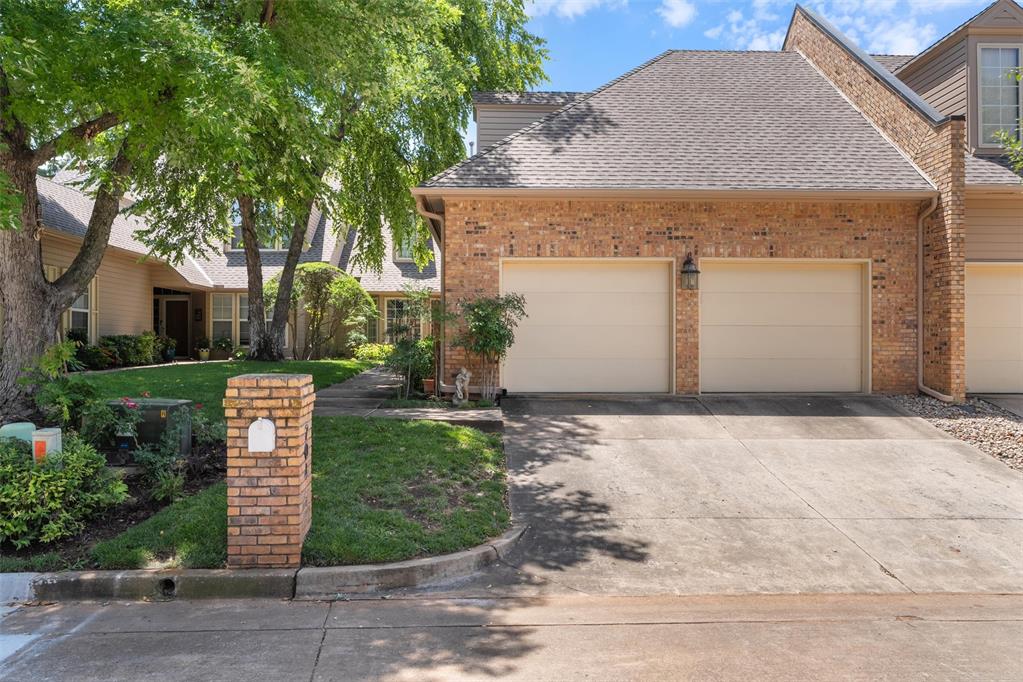 Wonderful 2 bed, 2 bath townhome in the gated Highlands of Oak Tree addition featuring 2 living areas, 2nd could be used as an office or exercise room, large kitchen with island and 2nd dining area, plantation shutters, wet bar, loads of storage throughout the home, covered walkway to oversize garage that would allow for a golf cart along with 2 cars with room to spare.  The back patio opens up to a lovely shaded common area with walking path.  HOA Dues cover all yard maintenance, gated entrance, drive by security, roof and exterior paint/ maintenance. Seller reserves Blue/ Silver light in kitchen, Light fixture in entry, silver sconce in master bath, light fixture in dining room, rain chain downspout at front door.