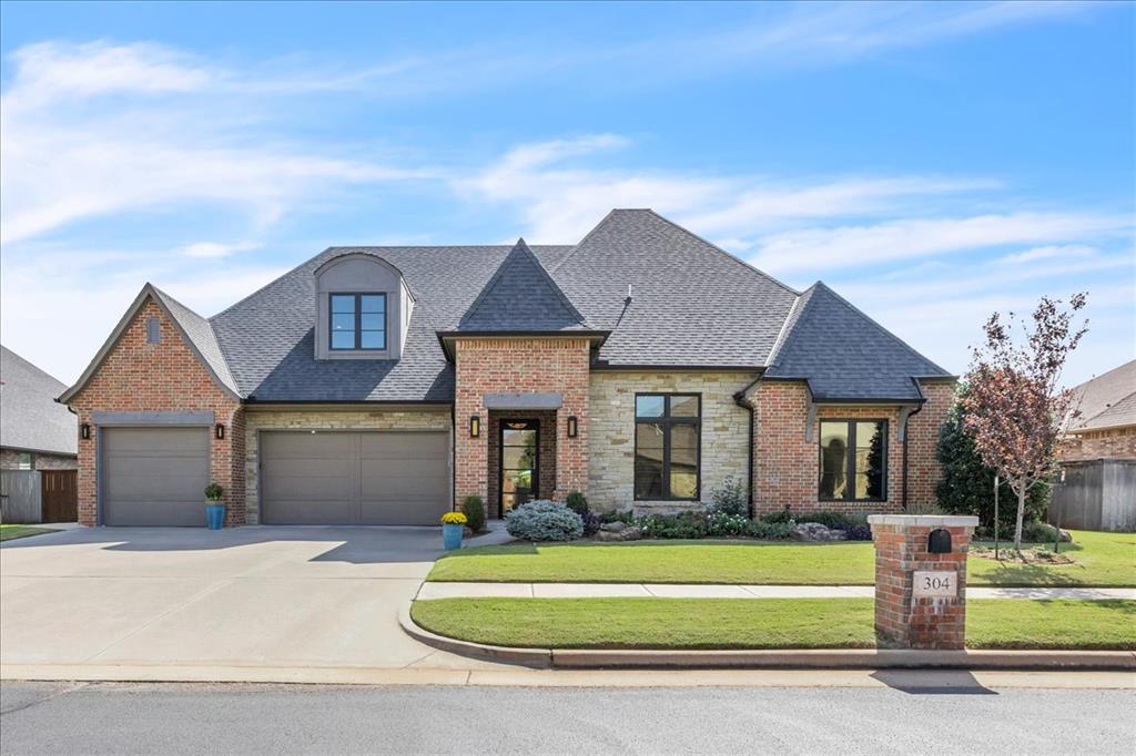 This remarkable Edmond home offers the perfect blend of elegance, space, and comfort. Step inside to find an open-concept layout filled with natural light, tall ceilings, and refined finishes throughout. The spacious living area flows seamlessly into a chef’s kitchen featuring stainless steel appliances, a large center island, and plenty of storage—ideal for entertaining or everyday living. Large retractable glass doors extending the living room out to the patio. The primary suite is a true retreat with a luxurious ensuite bath, dual vanities, and a generous walk-in closet. Secondary bedrooms are thoughtfully designed, offering flexibility. Your dream office with ample, custom built-in storage and filing cabinets, heated floors, desk and walk-in closet.  Upstairs, a bonus room or media area provides additional room for relaxation or playing games plus another full bedroom and bathroom. Enjoy outdoor living on the covered patio with phantom screens overlooking a beautifully maintained yard and pool—perfect for morning coffee or evening gatherings around the gas fire pits. Sport pool added in 2018 with ozone features, heater, hot tub, and gas fire bowls for decorative lighting at night. A few updated features include plantation shutters, some updated light fixtures throughout including a Jonathan Adler light fixture in entry way, extra decking in the attic, water heater in 2024, osmosis water system, Kohler toilets, added sidewalk from front to backyard, stained fence, pool with heater, LED can lights, storm shelter, outdoor lighting, and more. With its prime Edmond location, close to schools, shopping, and dining, this home combines style and convenience in one exceptional package. HOA includes 3 stocked ponds, dog park, park, walking trails, pool and clubhouse with workout facility, and 3 gates with night vision.