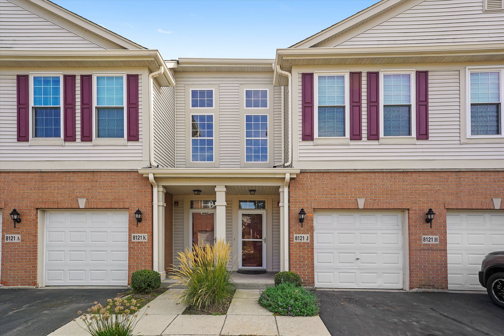 Welcome to this exceptional 2 bed, 2 bath condo in the highly desirable Asbury Woods community! Perfectly situated in the heart of the south suburbs, this move-in ready home offers convenient access to I-55 & I-294, scenic parks, and biking trails.    Step inside to an open-concept floor plan with 9 ft ceilings, abundant natural light, and a spacious private balcony with serene nature views (grill included). The beautifully remodeled kitchen features elegant charcoal stainless steel appliances, 42" cabinets, a breakfast bar, and a custom built-in wine rack-ideal for entertaining.    Additional highlights include: private front & garage entrances, extra-wide staircase making a grand entry, in-unit laundry, master suite with walk-in + double closets & private bath.    And the best part - recent updates for peace of mind: brand new A/C (2023), new bedroom carpets (2021), all new low-E, argon filled glass windows & balcony doors (2021) for increased energy efficiency and full kitchen & bathroom remodel (2017). This stylish, meticulously maintained condo combines comfort, function, and modern upgrades-ready for you to move right in.     Schedule your showing today-this one won't last!