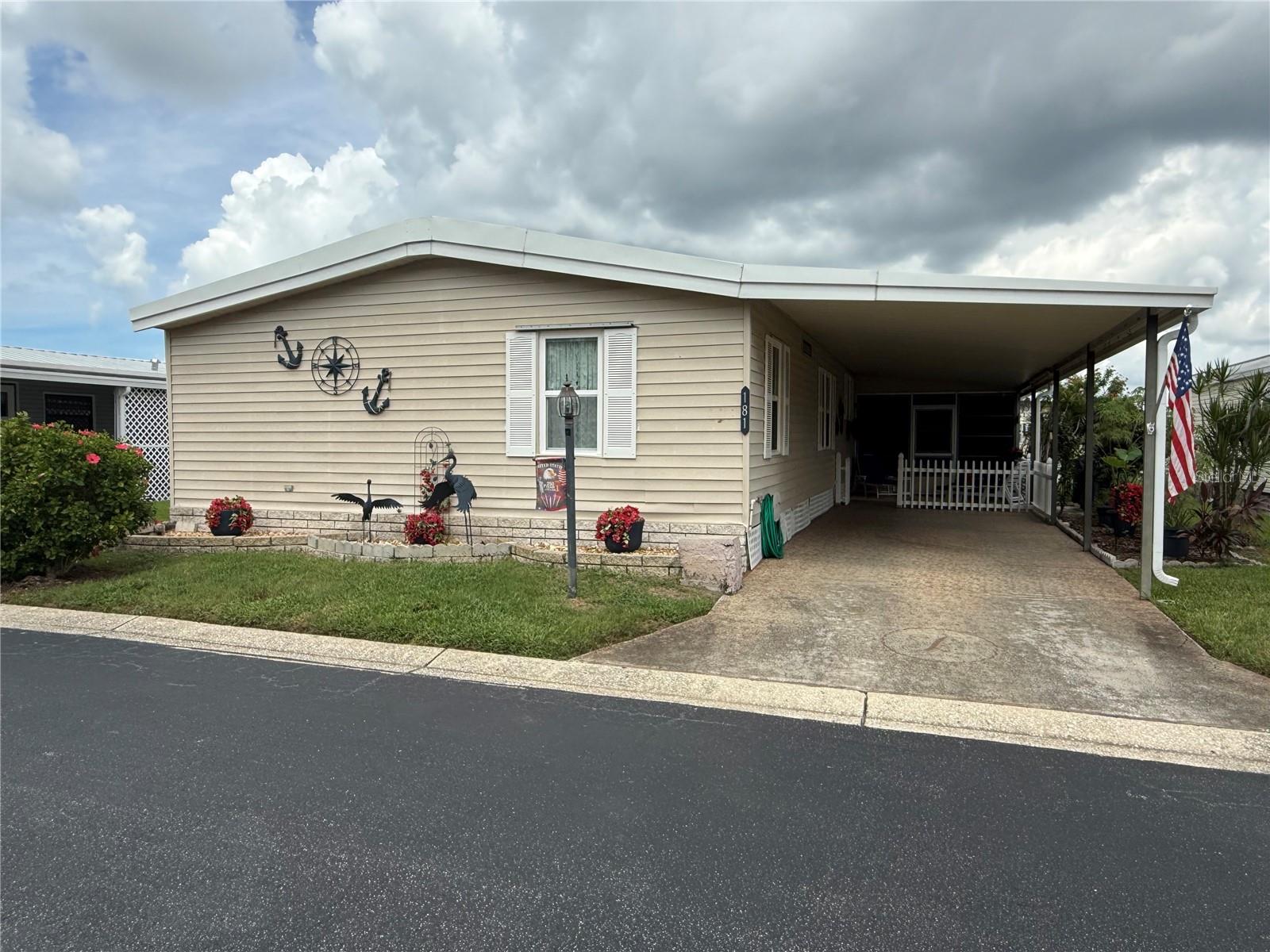 A RARE FIND IN GLENWOOD ESTATES! Enjoy the best of Florida living in this beautifully updated 3 bedroom, 2 bath home offering over 1,500 sq. ft. of heated living space in this desirable 55+ community where you own both the home AND the land - no land lease, no co-op, and no fractional ownership. Inside, you’ll find beautiful engineered hardwood flooring throughout the living areas and all three bedrooms - NO CARPET! The kitchen is a standout, featuring a center island with a cooktop and range hood, abundant cabinetry and counter space, a built-in oven, and a convenient dining area. The spacious living and dining areas offer plenty of room to relax, entertain, and make yourself at home. The primary suite features a well-appointed ensuite bath with a frameless glass shower door, while both secondary bedrooms offer generous space and walk-in closets. Another standout feature is the inside laundry room - a convenience rarely found in many homes in the community! Enjoy even more living space with a fully enclosed Florida room featuring abundant windows and additional storage, or relax outdoors in the covered carport area with parking for two vehicles and space for outdoor seating. The monthly fee of just $260 includes internet, cable, sewer, twice-weekly garbage pickup, and lawn care. Located outside a flood zone and just minutes from Indian Rocks Beach, shopping, dining, golf, and both Tampa Bay area airports, this home offers comfort, convenience, and an opportunity to enjoy the Florida lifestyle year-round!