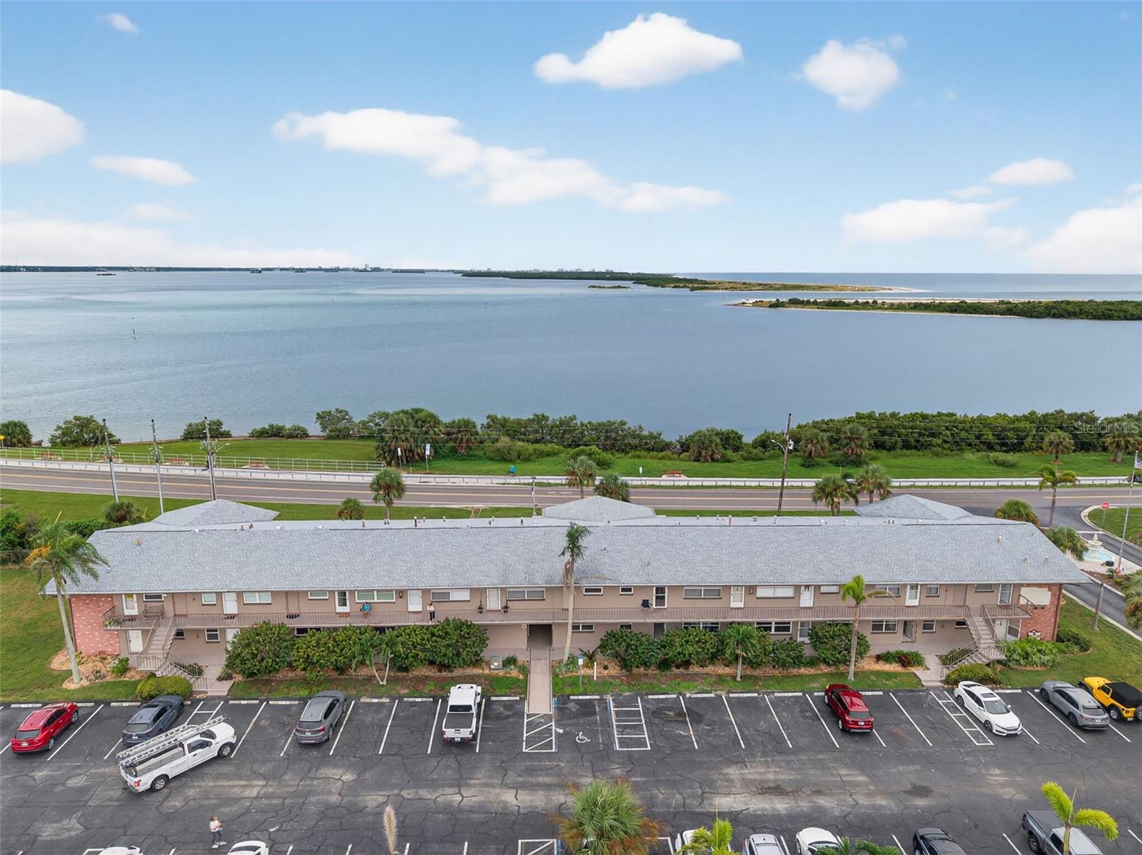 One or more photo(s) has been virtually staged. Welcome to Royal Stewart Arms, a premier 55+ waterfront community on St. Joseph Sound just steps from Honeymoon Island Beach. This 2-bedroom, 2-bath first-floor end unit condo is in the process of being fully renovated and offers a private entrance, reserved parking, and a spacious lanai with ocean views. Renovations include new drywall, fresh paint, new flooring throughout, new kitchen, new bathrooms, brand-new gas stove, refrigerator, dishwasher, granite countertops, and much more. HOA fees cover cable, internet, gas, water, sewer, and trash for added convenience. Community amenities feature a heated waterside pool, clubhouse with panoramic views, fitness center, sauna, billiards, fishing pier, tennis, pickleball, shuffleboard, bocce ball, and a vibrant calendar of social activities. Ideally located along the Dunedin Causeway, close to The Pinellas Trail, and minutes from downtown Dunedin's shops, restaurants, and breweries, this condo offers comfort, convenience, and the ultimate coastal lifestyle. The condo itself did not flood only water entered the crawlspace, prompting a full renovation for peace of mind.