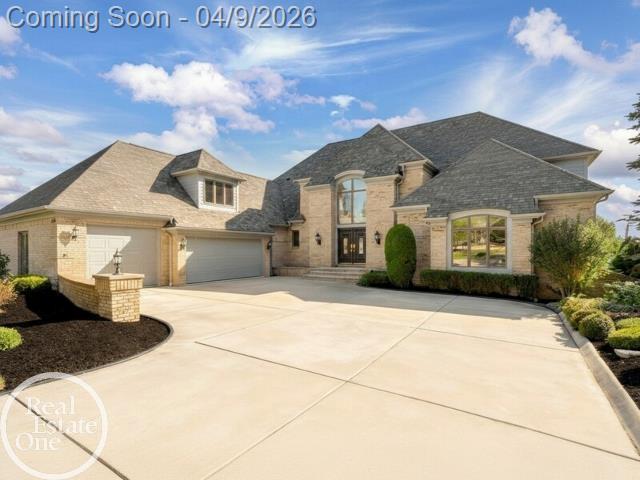 Welcome to this stunning 1.10-acre riverfront estate on the St. Clair River! Offering breathtaking views and exceptional living, this one-of-a-kind home combines elegance, space, and lifestyle. Step inside to a grand main level featuring a spacious living room with a fireplace, built-in bar, and floor-to-ceiling windows showcasing panoramic river views. The gourmet kitchen is perfect for entertaining and flows seamlessly onto a large deck overlooking the water. A generously sized home office adds flexibility for today's lifestyle. The finished walkout lower level is an entertainer's dream, complete with a second kitchen, fireplace, and indoor jacuzzi-ideal for guests or extended living. Upstairs, you'll find two primary suites, including an impressive executive closet spanning over 500 sq ft. Located within walking distance to downtown St. Clair and the Palmer Park boardwalk, this property offers the perfect blend of privacy, luxury, and convenience.Rare opportunity-riverfront living on over an acre!