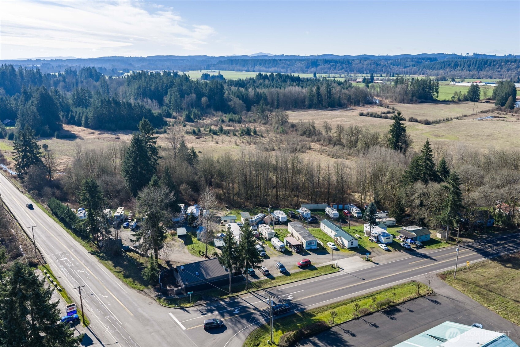 Grand Mound MH & RV Park | 25-pad mobile home and RV park generating $233,775 NOI at a 10.63% cap rate, with a projected pre-tax cash flow of $103,161 at current rents. The mix includes 10 dry pads with electrical hookups, six park-owned homes, and one stick-built home. The property operates on well water with newly installed equipment and four septic tanks, with an onsite building featuring two bathrooms, laundry, and owner's office. Additional upside through rent increases and 10 large storage units.