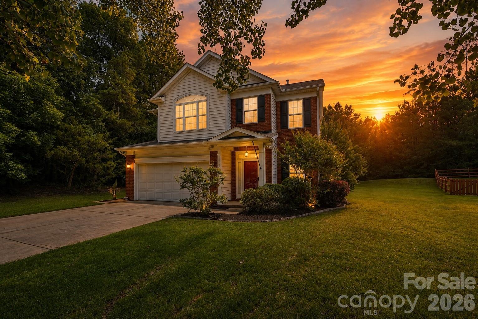 Tucked away on a peaceful cul-de-sac in Steelecroft Place, this inviting two-story home offers the perfect blend of comfort, privacy, and convenience. A welcoming foyer opens to a free-flowing floor plan featuring beautiful wood floors throughout the main living areas and a striking double-sided fireplace that creates a warm connection between the living room and dining room.The kitchen is designed for both everyday living and entertaining, featuring a center island, gas range, breakfast nook, and clear views of the backyard so you can enjoy the scenery while cooking or gathering. A conveniently located half bath completes the first floor.Upstairs, you'll find all four bedrooms along with the laundry room, providing a practical and functional layout. The spacious primary suite offers a peaceful setting with views of the surrounding trees, creating a relaxing retreat at the end of the day.Step outside to enjoy the private backyard oasis, complete with a patio and fire pit—perfect for quiet evenings, entertaining guests, or simply appreciating the peaceful surroundings. Unlike many neighborhoods, this lot offers a greater sense of space, with neighboring homes not immediately behind you and attractive fencing that enhances the view while maintaining privacy. In the evening, the home's illuminated windows create a warm and welcoming glow that highlights its charm.Adding to the appeal, a walking path just steps away connects Michael Lynn Road to DeHavilland Drive and the next section of Steelecroft Place, providing a short and safe walk to the neighborhood pool. The surrounding streets and paths also create an ideal environment for riding bikes, taking walks, and enjoying the neighborhood's friendly atmosphere.This home offers the rare combination of privacy, wooded views, neighborhood amenities, and a location that truly feels tucked away while remaining connected to everything Steelecroft Place has to offer.