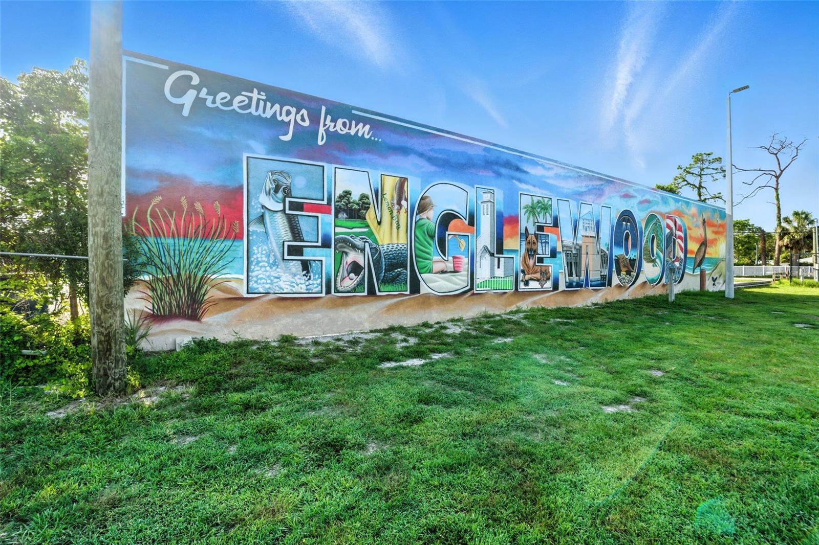 Fantastic opportunity in the heart of Englewood’s Historic Dearborn District! This 2,700 sq ft freestanding concrete-block commercial building is zoned Commercial General with the special Historic Dearborn Street/Main Street overlay district, which significantly expands allowed uses and value. The overlay encourages pedestrian-friendly, mixed-use development and permits live/work or residential units above commercial space, with potential for up to three stories (35 ft maximum height). The site was previously approved to add a second story, offering excellent expansion potential. Current layout includes three roughly 900 sq ft units: one is fully built out with modern finishes and storefront appeal, while the other two are open block and concrete, ideal for warehouse, storage, or easy conversion to retail, office, studio, or retail! The overlay zoning also supports expanded ground-floor commercial space, with potential to add another unit or increase floor area for office or retail. Features include three separate electric meters for flexible multi-tenant setups. Dedicated side parking lot for 4–6+ vehicles with potential for more, plus additional public parking in front. The property backs onto county green space with an amphitheater, public restrooms, and lawns that regularly host concerts, festivals, farmers markets, and events, driving high foot traffic. The rear wall showcases Englewood’s iconic “Greetings from Englewood” mural, offering landmark visibility. Prime walkable location steps to Mango Bistro, restaurants, coffee shops, boutiques, and all the vibrant energy of Dearborn Street. Ideal for investors, developers, or business owners looking to capitalize on one of Englewood’s most sought-after and flexible commercial corridors.