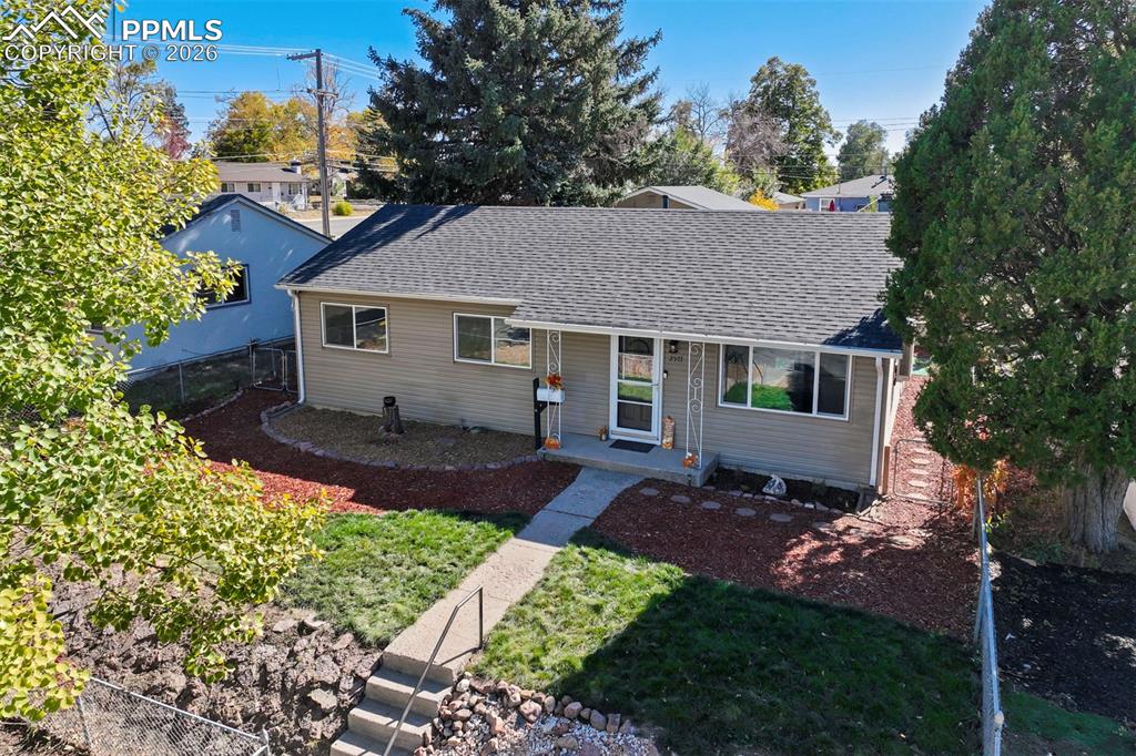 Tucked into an established Central Colorado Springs neighborhood, this charming ranch style home offers the kind of layout Buyers love- simple, functional, and full of possibilities.  This freshly updated home offers both comfort and convenience.  The interior features new paint throughout, fully refinished original red oak floors, new LVT in the kitchen , new doors, new windows complete with a stylish pinewood trim. Additional bonus features include a fully working jacuzzi tub in the bathroom, a wood burning stove, a swamp cooler in the living room that cools the whole house, and a new 150 amp electrical panel.  The exterior features a detached oversized two car garage with alley access as well as additional parking for you RV, boat, or other toys.  The possibilities for creating your own cozy backyard retreat are endless.  The concrete patio is begging for barbecues, string lights and a firepit for making smores.  This home is fully fenced front and back, so it is completely pet proof.  Don't miss the opportunity to own in this well established, charming Colorado Springs Neighborhood near downtown, parks, schools, shopping, restaurants, entertainment, hospitals, and so much more.  Don't wait to schedule a showing, this one won't last!Roof Replaced: August 2023New Electric Panel: October 2025