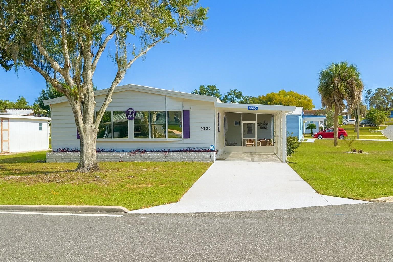 Modern 2-Bedroom, 2-Bath Home in 55+ Gated Golf Club Community – Highpoint, Brooksville, FLMove-in ready 2-bedroom, 2-bath home in the 55+ gated Highpoint Golf Club community, where you own the land. Fully remodeled in 2024, the home features cathedral ceilings, a fireplace, inside laundry, and a completely furnished interior with all-new furniture, including 2 Smart TVs (65" living room, 50" master) and new ceiling fans. The kitchen boasts new appliances with hood fan, and the home has been upgraded with a new TPO roof (40–50 year lifespan), new A/C (June 2025) with 10-year warranty, new bathroom vanities, faucets, toilets, and plumbing, new A/C vent covers, new hot water tank, vinyl plank flooring throughout, new lighting in the workshop, new blinds, and a screened lanai. The community offers a clubhouse, pool, shuffleboard, pickleball, tennis, and numerous activities for an active lifestyle. Leaf filters and gutter system installed. Watch the video tour for a closer look at this turnkey home!
