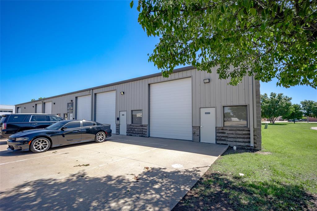 FOR LEASE! Located at 2709 Bart Conner Court, this space includes a 242-square-foot office, an ADA-compliant restroom, and a 1133-square-foot warehouse. The warehouse has a 12' x 14' overhead door with an operator, unit heater, LED lighting, and a 16-foot clearance height. The space includes four parking spaces, and a minimum lease term of three years is required. Don't miss this opportunity!