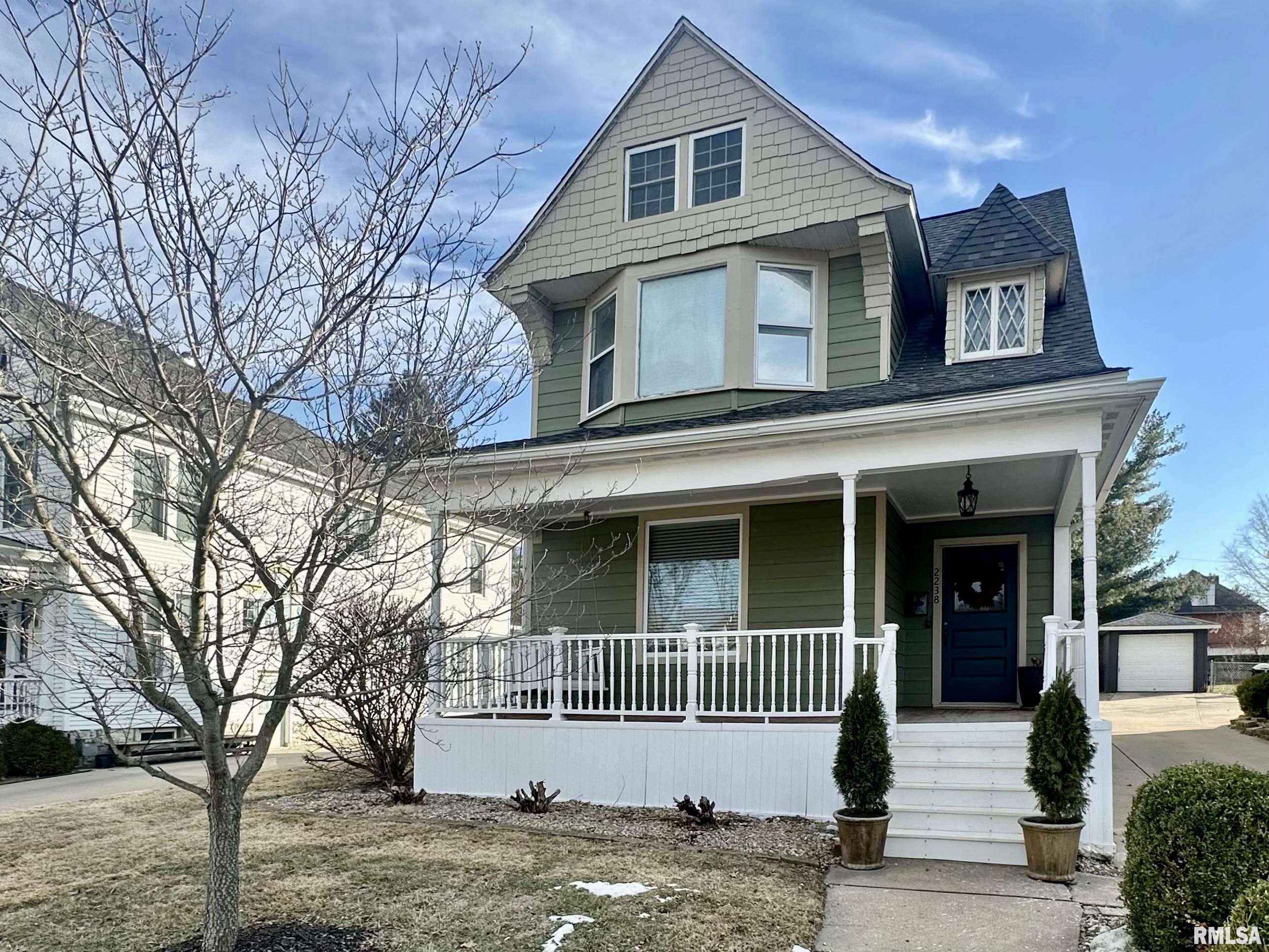 Welcome to this charming historic home on beloved Hampshire Street, where timeless character meets thoughtful modern updates.  This 3-bedroom, 1 1/2 bath residence showcases beautiful original details, including a stunning staircase and original wood floors throughout most of the home. The inviting layout offers generous living and dining spaces filled with natural light and historic charm.  Upstairs, the third level is partially finished (not included in square footage),providing flexible bonus space ideal for a home office, studio, playroom, or guest retreat. Recent improvements bring peace of mind while preserving the home's integrity.  Exterior updates include a roof replacement and tuck pointing completed in 2024, along with siding in 2023.  Inside, the kitchen has been refreshed with appliances (oven, refrigerator, microwave, and dishwasher) since 2023.  Water heater has also been replaced. Rich in character, lovingly maintained, and located on one of the area's most charming streets, this Hampshire street home is a rare opportunity to own a piece of history with the comforts today's buyers appreciate. Other exterior is fiber cement siding. Laundry could be moved to main level.
