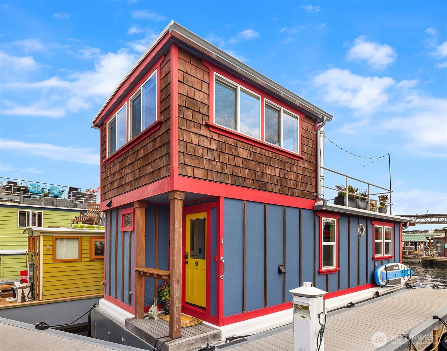 Welcome to Hah Choo, a 2002 Thomas Bailey Custom 39 House Barge that captures the best of waterfront living. Filled with natural light, this meticulously maintained home offers views of the Seattle skyline and a vibrant, walkable neighborhood w/Gas Works Park and the Burke Gilman Trail just steps away. With high ceilings, a well-designed layout, a modern kitchen, & generous storage, Hah Choo is one of the most livable houseboats on the lake—perfect for cruising to dinner, catching a sunset on the water, or simply enjoying the magic of lakeside living. Refinished hardwoods, cozy wood stove, a stunning roof deck, spacious bath w/luxurious shower, onboard washer/dryer, rain detecting skylight & more. Come live the quintessential Seattle dream!