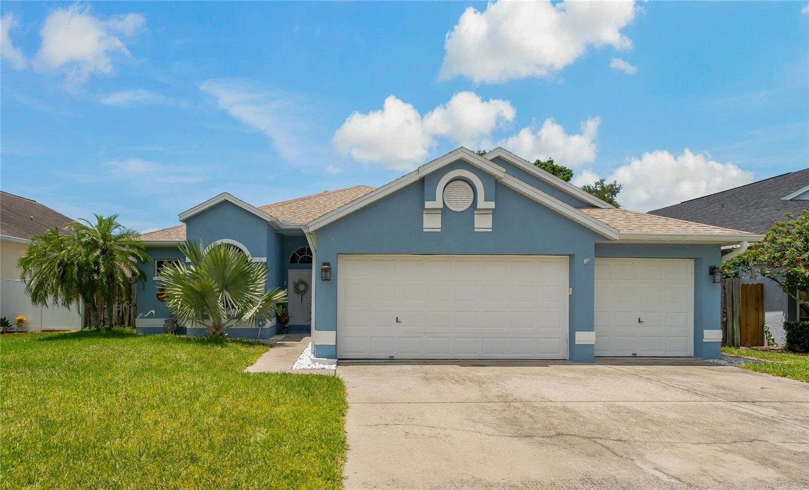 Welcome to this move-in ready home located in the desirable gated community of Forest Ridge—just minutes from everything Tarpon Springs has to offer. This 3-bedroom, 2-bathroom residence includes a spacious 3-car garage and boasts numerous recent updates: LVP flooring (2024), Fresh interior paint throughout (2024), Saltwater pool conversion (2022), Pool enclosure re-screened (2024), Custom blinds (2022), Roof (2018), HVAC (2015), Water Heater (2022). Step inside and enjoy the open-concept floor plan that's perfect for entertaining. The kitchen features stainless steel appliances, granite countertops, and ample space for gathering with family and friends. The family room is centered around a cozy fireplace and flows seamlessly to the outdoor lanai and screened pool area—ideal for Florida living. The primary suite offers a sliding glass door with direct access to the pool, a generous walk-in closet, and a spacious en-suite bathroom with a garden tub. The split-bedroom layout ensures privacy for both owners and guests. Located just minutes from historic downtown Tarpon Springs where you’ll enjoy a wide variety of dining options and the famous Sponge Docs with  authentic Greek cuisine. Nearby attractions include Fred Howard Park, Sunset Beach, Honeymoon Island, the Pinellas Trail, and the Anclote Boat Ramp. All that’s left to do is move in and start enjoying the Florida lifestyle!