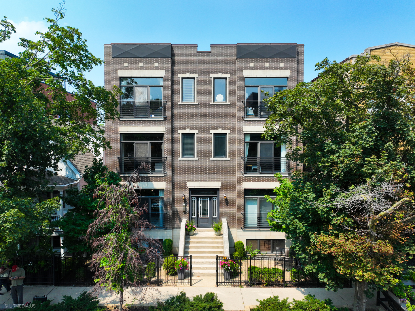 Amazing opportunity to own a sophisticated 2 bed, 2 bath condo in the heart of Roscoe Village, located in the coveted Audubon School District. This sun-drenched residence  boasts soaring 10' ceilings, rich hardwood floors, detailed crown molding, and custom California Closets. The chef's kitchen impresses with 42" cabinetry, granite counters, stone  backsplash, and premium stainless steel appliances. Retreat to the luxurious primary suite featuring a walk-in closet and spa-caliber bath with soaking tub and separate glass shower.  Enjoy surround sound wiring, Nest thermostat, a security system, and a spacious private back deck perfect for entertaining. Professionally landscaped front patio and backyard offer  additional outdoor living. One dedicated parking space included. Walk to top-rated dining, boutiques, parks, and the Paulina Brown Line. This is elevated city living at its finest.