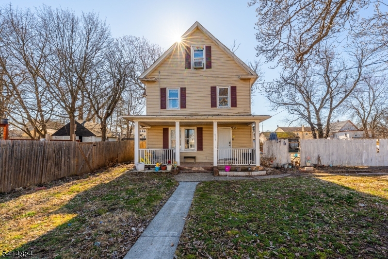 Welcome to this rare mother-daughter style Colonial in the highly desirable Netherwood Heights neighborhood. Partly refreshed in 2025, this exceptionally spacious home provides flexible living arrangements across four distinct levels, making it a fantastic opportunity for various living situations. Come in from the classic open front porch to the first level, which shines with sleek flooring and a gorgeous modernized kitchen boasting crisp white cabinetry, stainless appliances, and a lovely peninsula. This bright space flows effortlessly into a sunlit dining area and a living room, complemented by two well-proportioned bedrooms and a full bathroom. Upstairs, the second level features a cozy second living room, an additional dedicated kitchen, three more bedrooms, and another full bathroom. The finished attic is a fantastic bonus, complete with its own full bathroom, making it appropriately set up for a private primary suite or retreat. Downstairs, the partially finished basement expands your options with a full bathroom, two extra rooms, and a generous recreation space that currently highlights its potential for a home studio or gym. Outside, enjoy a remarkably deep driveway for ample parking, a sprawling backyard ready for summer gatherings, and eco-friendly solar panels. Conveniently located just blocks from the Netherwood Train Station and the bustling shops along South Ave!