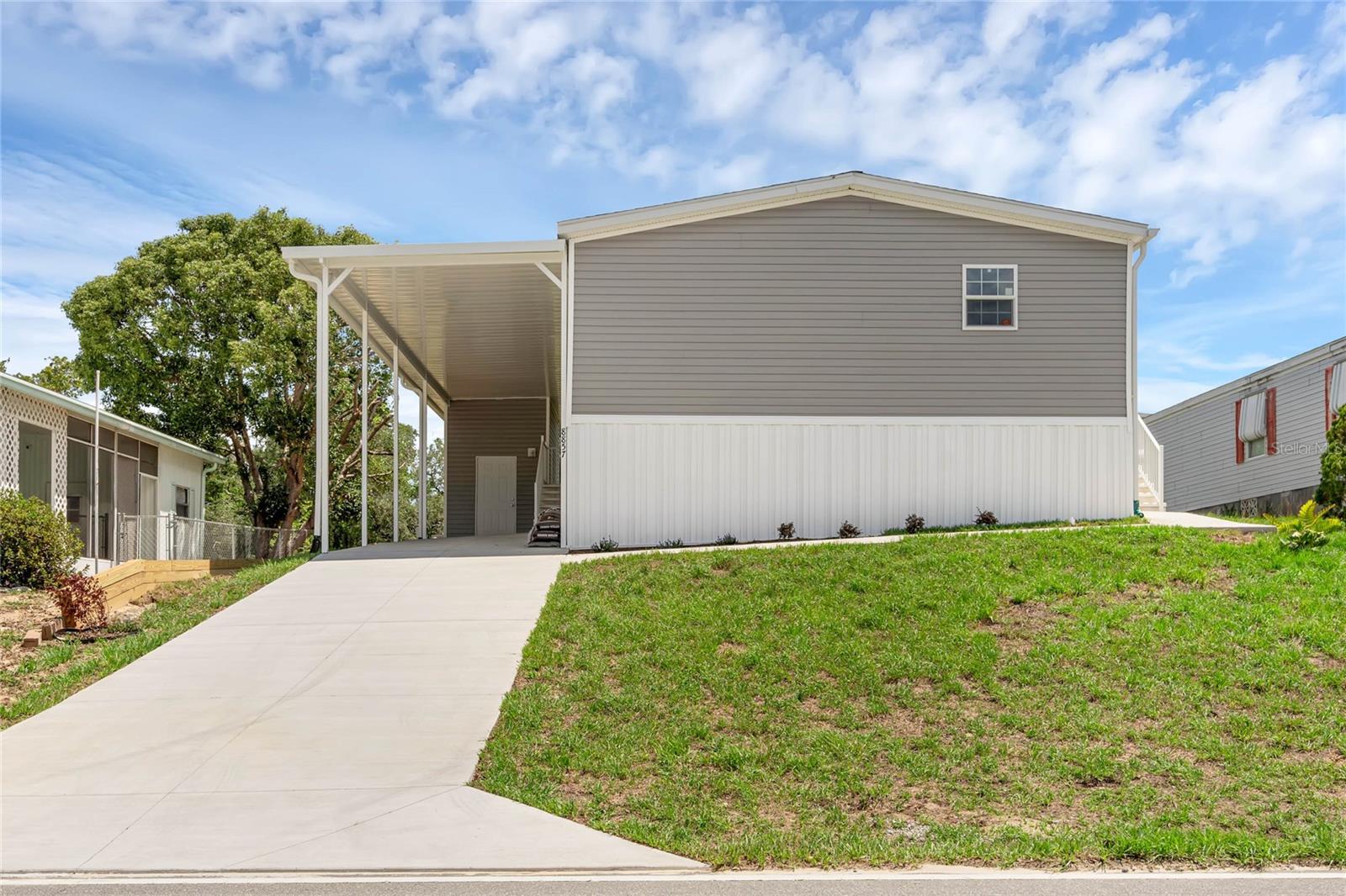 SELLER FINANCING AVAILABLE **Brand New 3-Bedroom, 2-Bathroom Mobile Home in a Serene 55+ Community** Welcome to your dream retirement home! Nestled in the tranquil High Point 55+ golf community, this brand new manufactured home offers the perfect blend of modern comfort and peaceful living. From the moment you step through the door, you'll experience the pinnacle of convenience and relaxation. Rest easy in three generously sized bedrooms, perfect for accommodating guests or transforming one into a home office or hobby room. Two elegantly designed bathrooms provide ample space for your daily self-care routines. The master bathroom offers a private oasis, featuring a stylish shower and all the amenities you desire. The open living, dining, and kitchen area creates a seamless flow and a perfect space for entertaining or simply enjoying your everyday life. Whip up your favorite meals in the modern kitchen, complete with brand new appliances, sleek countertops, and plenty of storage space. Embrace the tranquility of a 55+ community, where you can relax in peace and enjoy the company of your neighbors. Conveniently located near shopping, dining, medical facilities, and more. Everything you need is just a short drive away. This is your opportunity to start a new chapter in your life and relish the simplicity and comfort of this beautiful mobile home in a peaceful 55+ community. Don't miss out on this fantastic chance to make your dreams a reality! Your dream home awaits!