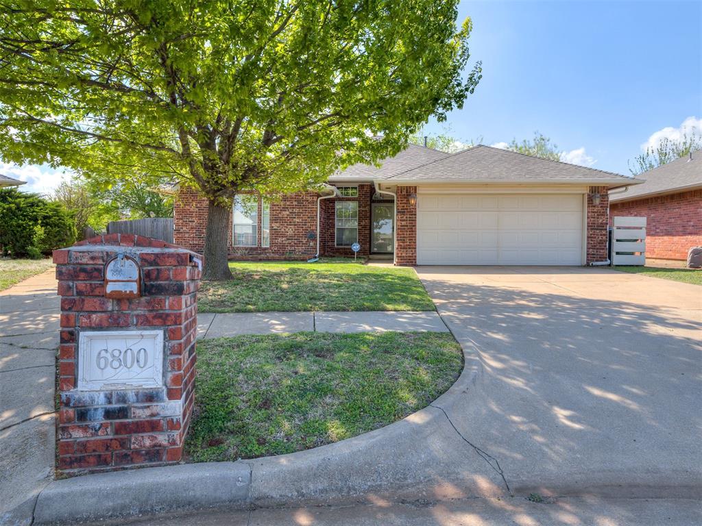 Located in the gated addition of Westlake, Deer Creek schools and priced to sell this beautiful home is ready for new owners! Entry opens to a large main living space with floor to ceiling windows spanning the entire back wall allowing the home to fill with natural light and offering views into the back yard. The main living area is large, open, centers around a double sided fire place, has an extra “reading nook” and opens to the kitchen making this the perfect space for entertaining or family gatherings. The kitchen is U-shaped with cabinets and granite countertops lining both sides proving plenty of storage and prep space. Kitchen hosts under the cabinet lighting, stainless steel appliances, a wrap around bar for extra seating and opens to the dinning area. The dinning area is decent sized and offers three large windows with views of the side yard. Home has a great split floor plan with the master located off the living room to the south, a 2nd bedroom at the front of the home over looking the front yard, and a 3rd bedroom to the north of the home. The master is large and open proving enough space for any arrangement of furniture and features two good sized windows over looking the back yard. The master bath which a  walk in tile shower, soaking tub, double vanities, and a walk in master closet. The central 2nd bedroom is good sized, has a stained concrete floor, window overlooking the front of the home, and standard closet. The 3rd bedroom is the most private, good sized, also has a window overlooking the front of the home and hosts an over sized closet. Hall bathroom hosts a granite vanity, overhead storage with standard tile tub/shower combo. Laundry room is located off the garage with an extra closet for storage. Access to back yard can be found off the kitchen and hosts a good sized covered patio. The yard spans to the north side of the home offering an extended area for play, has a large shed, is fully fenced with a double gate for easy access.