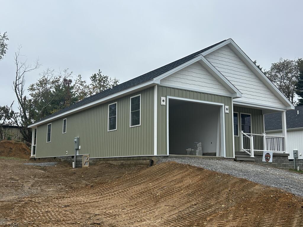 New Construction with Modern Style and Country Views!  Your dream home is here! This stunning new construction offers 3 bedrooms, 2 baths, and over 1500 sq ft of space making it the perfect blend of modern elegance, comfortable living, and peaceful country charm--all nestled at the edge of town limits.  Step inside and fall in love with the impressive open-concept great room, featuring soaring vaulted ceilings that create an airy spacious atmosphere.  The beautifully appointed kitchen is a true showstopper featuring crisp white shaker-style cabinetry, gorgeous granite countertops and top of the line appliances.  Make this home yours and enjoy your morning coffee while sitting on the covered porches and enjoying the mountain views.  This is the best of both worlds..where town and country collide. Call today to view. Expected completion date by October 30, 2026.