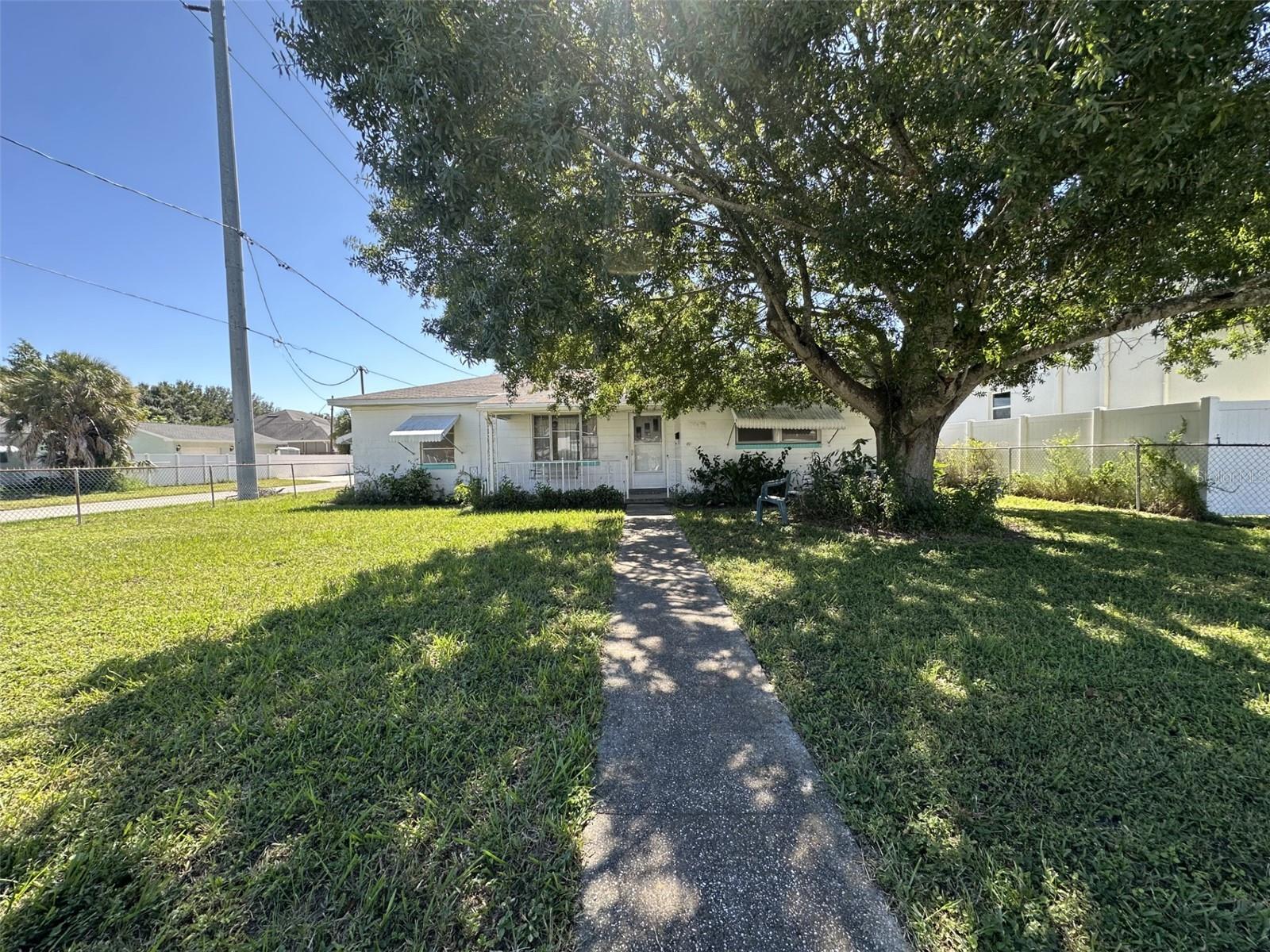 This one owner home on a corner lot is available for the first time since 1951! Situated between Ballast Point & Sun Bay South this property provides the opportunity to either renovate the existing home or secure a lot for your custom build. The home offers 3 bedrooms, 2 bathrooms, a separate dining room, living room, family room, a centrally located kitchen, a covered carport, front covered porch & a rear covered & screened in rear lanai. The home has a good sized backyard, a generous sized front yard & a side facing driveway with covered carport. The property is close to shopping, dining & retail while being located 15 to 20 minutes from all that Tampa has to offer! Call today to schedule a private showing!