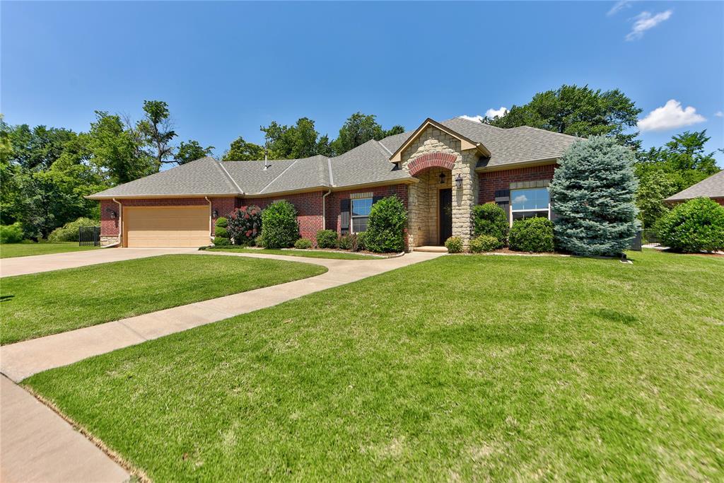 Move In Ready! LOOK at this Elegant, 3 bed, 2 bath, 2 car, oversized garage home in a Gated Community. The home sits on a corner lot with private wooded greenbelt where you can watch the deer and enjoy the tranquil creek running beside the greenbelt. This home is located in a private, secured community with ponds and fountains through out the neighborhood.  The home invites you to enjoy a well designed interior featuring open kitchen with granite counter tops, walk-in pantry, stainless appliances, including built in oven, microwave, dishwasher and refrigerator which are included in the home.  Also featured are plantation shutters, canned lighting and  a gas fireplace with gas logs equipped with on/off switch.  Home also includes office with closet which can be used for 4th bedroom. The primary suite overlooks serene back yard, with a grand bathroom featuring two vanities, large walk-in closet with built ins and center island.  Walk out into the back yard where you can relax on the private, covered patio, surrounded by a beautiful yard maintained by the HOA.  The exterior of the home features up dated guttering and a full sprinkler system.  So much to offer...a MUST SEE!