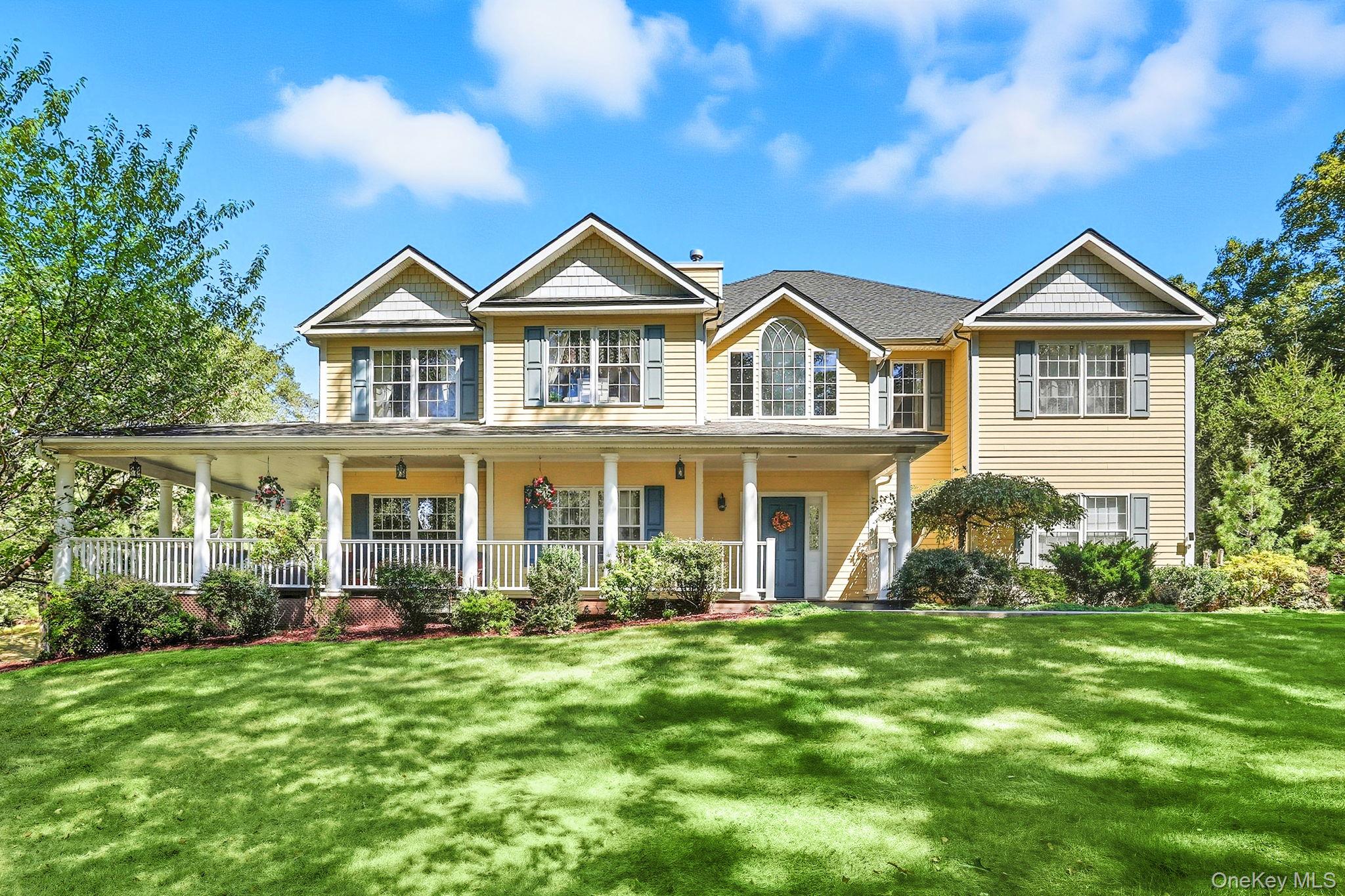A refined expression of modern Colonial living, this exceptional 4-bedroom, 5 full bath residence offers nearly 6,000 square feet of impeccably finished space, including a walk-out lower level, in one of Chappaqua’s most coveted settings. Built in 2012 and featuring natural gas and municipal sewer—an uncommon and highly desirable pairing—this home delivers a rare combination of quality, scale, and convenience. A gracious double-height foyer introduces interiors defined by sophisticated millwork, elevated ceiling heights, and beautifully proportioned rooms filled with natural light. The main level unfolds seamlessly, offering elegant formal spaces alongside a more relaxed, open-concept kitchen and great room designed for effortless entertaining. The kitchen is appointed with premium appliances, custom cabinetry, and refined finishes. A private first-floor office provides a quiet and polished work-from-home environment.The primary suite is both expansive and serene, featuring a spa-quality bath and three walk-in closets—an exceptional and rarely found level of closet space. Three additional bedrooms are generously sized and complemented by well-appointed full baths.The walk-out lower level offers a substantial extension of living space, ideal for a media lounge, fitness studio, recreation, or guest accommodations, with flexibility to suit a variety of lifestyle needs. Set on a beautifully landscaped property with sweeping lawns and a welcoming wraparound porch, the outdoor living experience is equally compelling—offering privacy, presence, and multiple spaces for entertaining or quiet enjoyment. Turnkey and timeless, this is a rare opportunity to own a newer construction home of this caliber in a premier Chappaqua location.