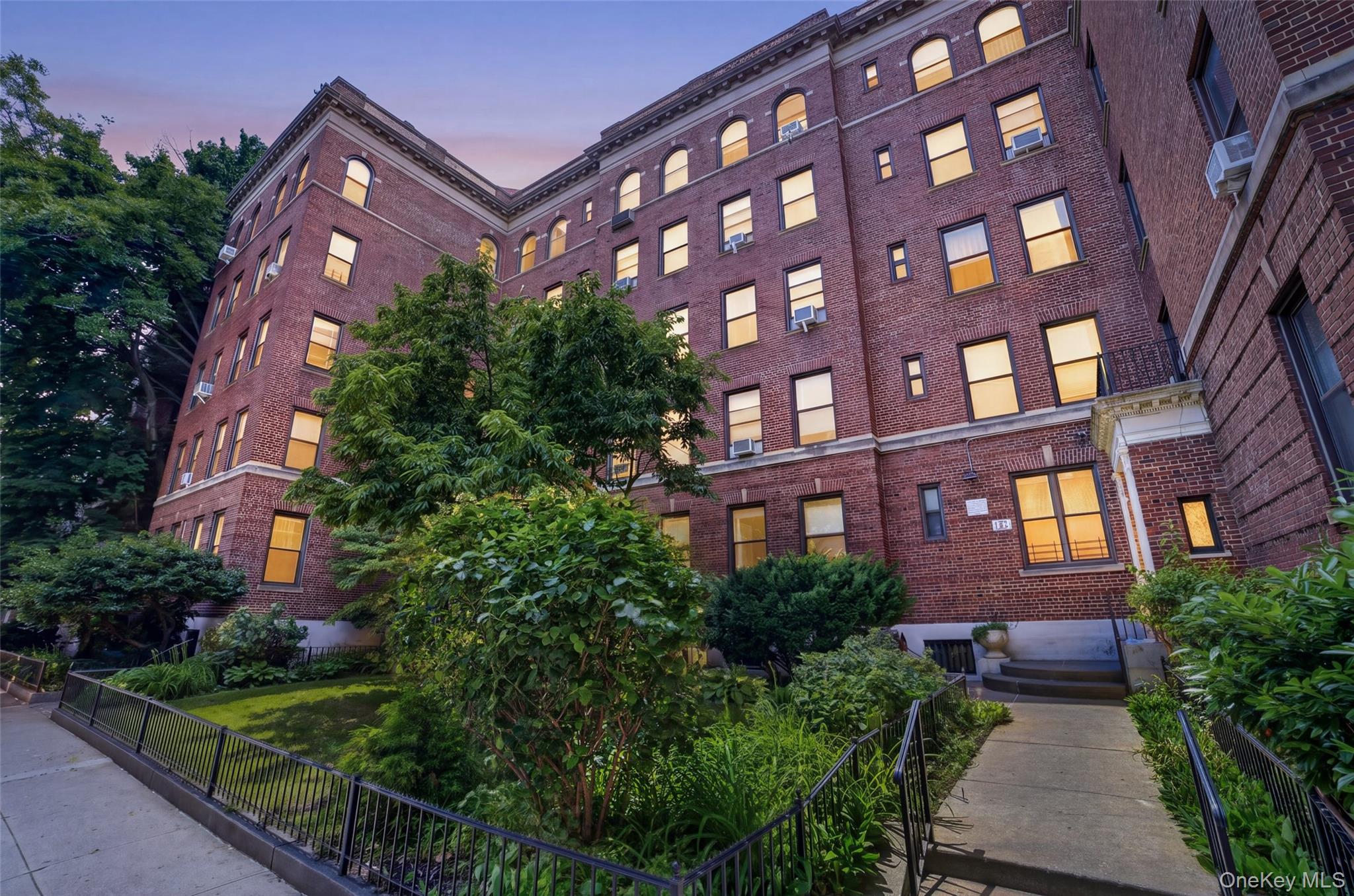 Welcome to this unique 2-bedroom, 1-bathroom cooperative apartment located in the renowned Historic District of Jackson Heights. As part of the nation’s first planned "garden apartment" community developed in the 1920s, this residence beautifully pairs rich architectural heritage with tranquil living.This spacious garden apartment features classic pre-war elegance, including high ceilings, original french doors, oak hardwood floors with mahogany inlays, and a wood burning centerpiece fireplace. A rare and notable feature of this unit is the bright sunroom, which offers a versatile space for a home office or reading nook with views of the beautiful private interior courtyard. Additionally, the building is pet-friendly and provides practical amenities such as a live in Superintendant, common laundry room, an assigned storage room, and a bike storage area.The property is perfectly situated for both convenience and lifestyle, located just steps from public transportation for an effortless commute to Manhattan or other boroughs. It is also in close proximity to the boutiques and restaurants of the 37th Avenue corridor and provides quick access to the diverse dining and shopping options along Northern Boulevard.This property is expected to move quickly! Let's schedule a viewing to experience this culturally rich historic enclave in person.