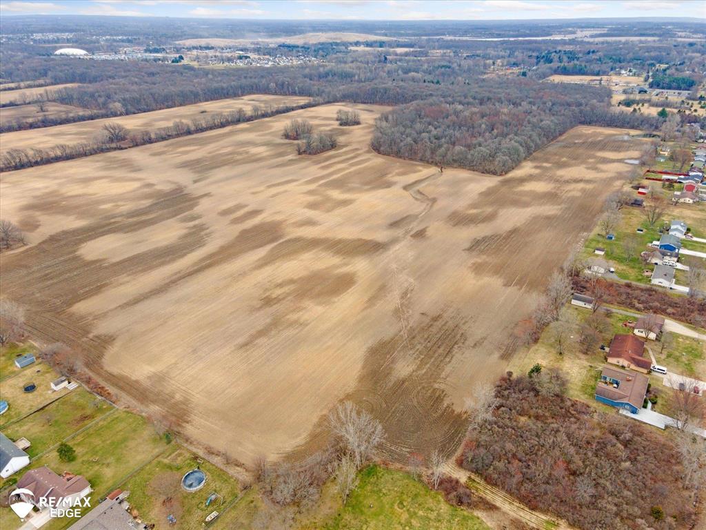 Large parcel !OUTSTANDING OPPORTUNITY! Located off Reid Rd East of Jennings Rd. 223.46 acres in Mundy Township. Zoned Agricultural/ Residential. Ideal area for 337 homesites with mature trees and open green space areas on the property. The parcel has sanitary all the way around it and there is water at the corner of Grand Blanc Rd. and Torrey Rd. as well as Reid Rd. and Torrey Rd. Close to I-75 and Henry Ford Hospital. Currently being farmed annually.