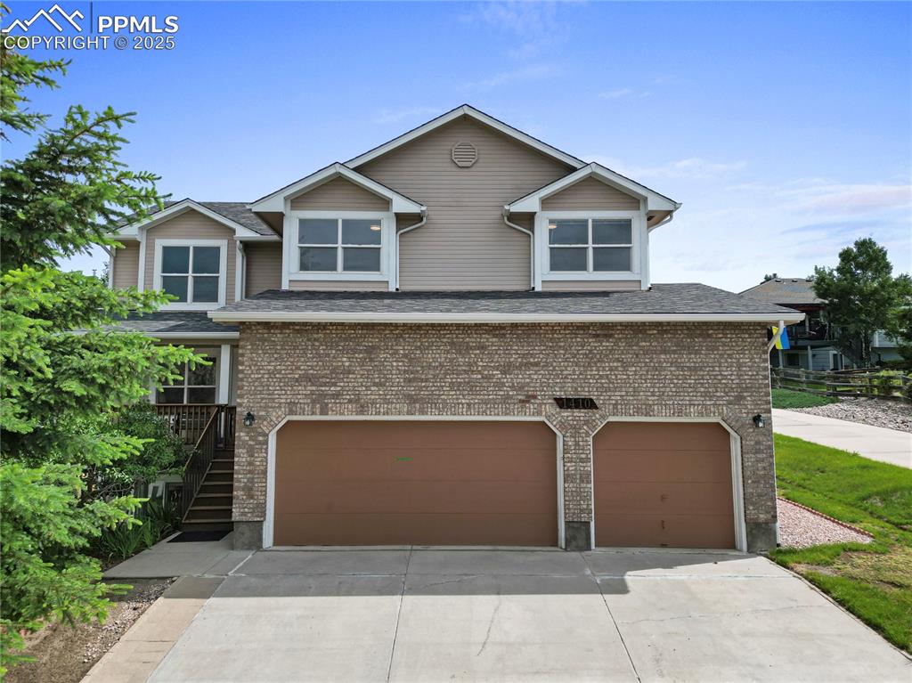 Welcome to your beautifully finished home nestled in the sought-after Trail Ridge community. Thoughtfully designed and impeccably maintained, this residence offers comfort, style, and stunning views in every direction. From the moment you arrive, you’ll notice the inviting curb appeal, highlighted by a spacious covered front porch—perfect for relaxing and enjoying the picturesque Colorado sunsets.

Step inside to discover an open and functional floor plan with abundant natural light. The main living area flows effortlessly from the large family room to the dining space and modern kitchen, ideal for everyday living or entertaining. High ceilings, quality finishes, and tasteful color choices create a warm and welcoming atmosphere.

Upstairs, the expansive primary suite is a true retreat, featuring panoramic views from both the front and back of the home. Enjoy your morning coffee while watching the sunrise over the horizon, or unwind with breathtaking mountain vistas in the evening. The en-suite bathroom offers a dual vanity, walk-in shower, soaking tub, and generous walk-in closet.

Outside, the elevated redwood deck provides a perfect space for dining al fresco, hosting gatherings, or simply taking in the views of Pikes Peak and the surrounding landscape. The backyard is fully fenced and offers room to garden, play, or relax.

Additional highlights include a large unfinished basement with room to expand, an attached two-car garage, central A/C, and easy access to parks, trails, shopping, and major commuting routes.

This is one of the few remaining homes built by the highly regarded Masterbilt team in Trail Ridge—don’t miss your opportunity to own a thoughtfully crafted home in a prime location. Schedule your private showing today!
