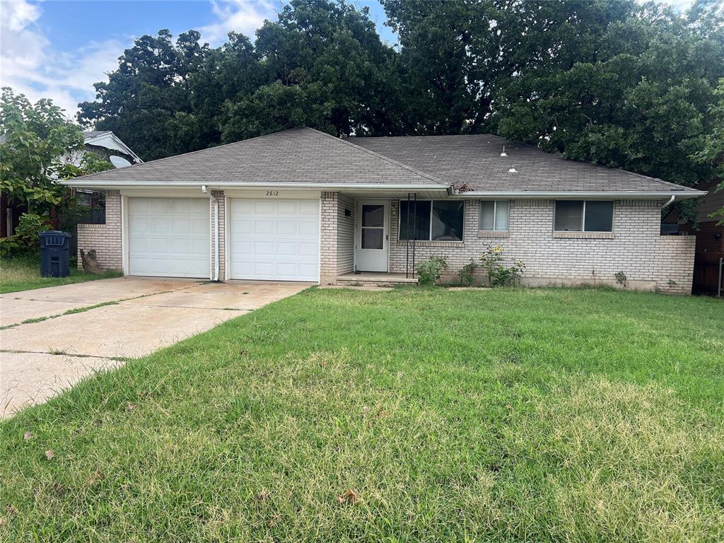 Great starter home with lots of potential.  Three bed and 1.5 bath.  Kitchen has new oven and new electrical panel.  New water heater just installed.  Quiet and quaint with large trees for shade over outdoor patio/deck. Two car garage and large fenced back yard.