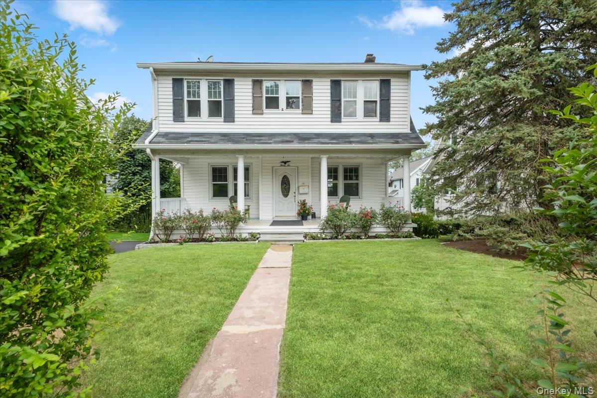 Welcome to this sun-filled home in the sought-after Highlands neighborhood, perfectly located close to schools, shops, and houses of worship. A welcoming rocking chair front porch sets the tone, opening to a charming entry that leads to the spacious living room with wood-burning fireplace, formal dining room, and an expanded kitchen which offers plenty of room for casual dining and opens through glass sliders to a covered deck; ideal for entertaining friends and family. A unique staircase tucked toward the back of the home enhances the open flow without intruding on the entry. The second floor features a generous primary bedroom suite with a large walk-in closet, full bathroom, and an adjoining room that can serve as a home office, study, or nursery. Two additional bedrooms and a hall bath complete this level. The unfinished attic provides additional flexible storage space while the unfinished basement includes laundry, storage, and direct access to the backyard. The original garage has been repurposed to a storage room but can easily be converted back to accommodate one car. The current driveway provides room to park three cars. Additional highlights include hardwood flooring throughout, a recently installed oil burner (2 years old), a new stove and dishwasher. The lush backyard offers plenty of room for play, relaxation, and gatherings. 36 Bryant Avenue has abundant natural light and radiates warmth and happiness—ready to welcome its next owners!