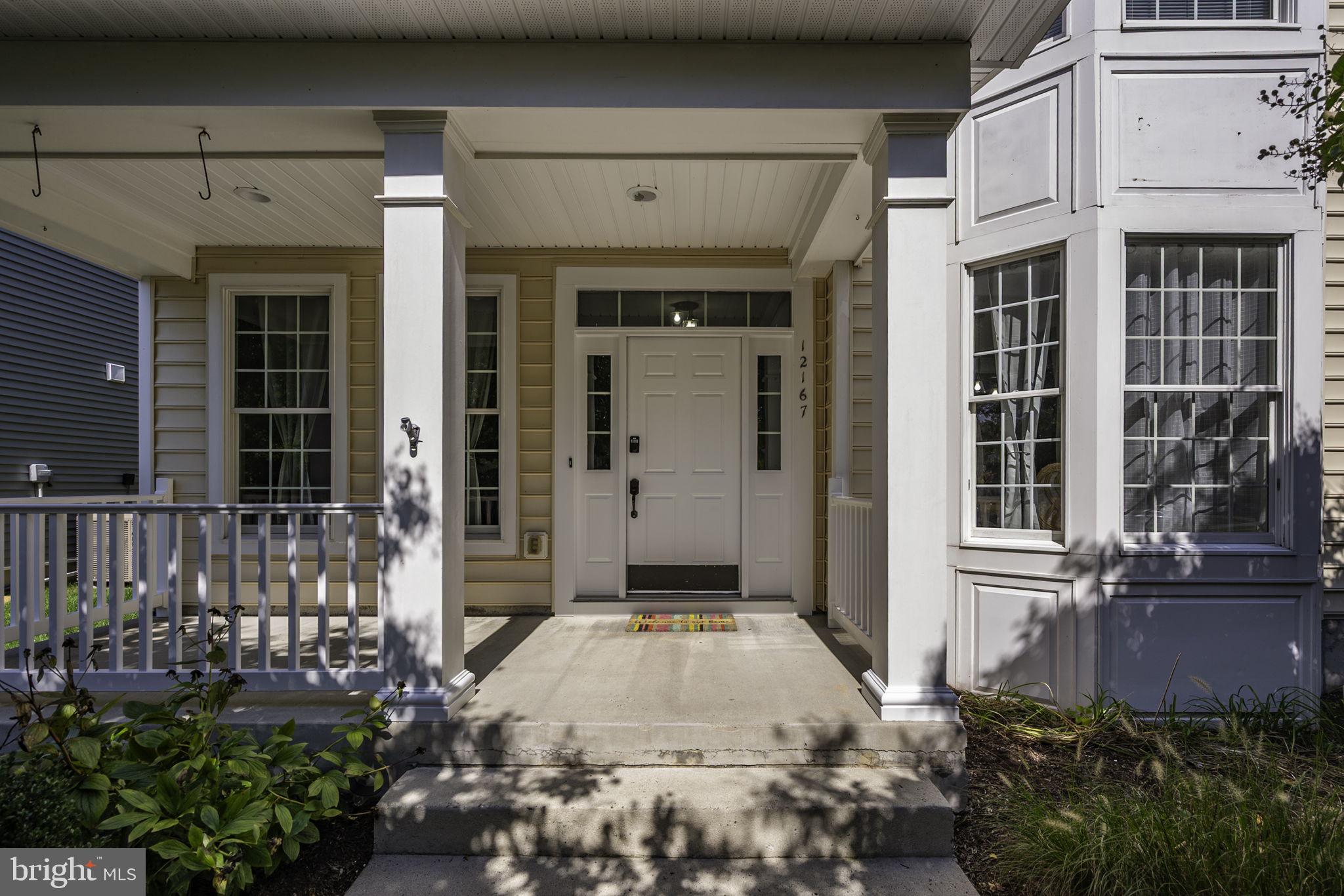 Newly priced at 12167 Snug Harbour Rd, Berlin, MD – Tucked within the sought-after community of The Landings at Bayside, this beautifully maintained home offers spacious living, resort-style amenities, and unbeatable access to everything the Eastern Shore has to offer. A welcoming front porch with a cozy sitting area sets the tone, while the rear yard features a private patio—perfect for grilling and outdoor entertaining. Inside, the first floor boasts a formal living room and dining room, an open-concept kitchen with breakfast area, a family room with fireplace, and a convenient guest half bath. The second level includes a luxurious primary suite with soaking tub, double vanity, separate shower, plus three additional bedrooms—and a full hall bath. The third floor provides a large bonus space ideal for a fifth bedroom, playroom, game room, or guest suite, complete with a full bathroom. Enjoy the convenience of a detached garage and direct access to a community pathway that leads just a short distance to the pool and clubhouse. With low taxes, affordable HOA fees, and short-term rentals allowed, this home is perfect as a primary residence, vacation getaway, or investment property. The Landings at Bayside offers an exceptional lifestyle with indoor and outdoor heated pools, fitness center, game room, tennis and basketball courts, crabbing pier, stocked fishing pond, kayak launch, nature trails, tot playground, and two community docks with breathtaking bay views. Lawn care and trash service are included, making life here as easy as it is enjoyable.