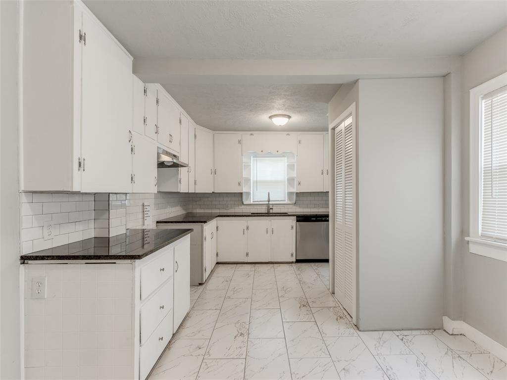 3 bedroom home with standout 2023 updates that bring modern comfort and timeless appeal. The kitchen is a true highlight, featuring bright painted cabinetry with updated hardware, upgraded countertops, an undermount sink, updated faucet, and a classic subway tile backsplash that feels both stylish and functional. The bathroom has also been tastefully updated with a new tub and tile surround including a built in shampoo cubby, updated vanity and mirror, and refreshed finishes for a polished and inviting feel. Additional improvements include updated flooring in multiple areas, fresh interior paint, updated lighting, and numerous thoughtful detail upgrades throughout the home. A 2023 HVAC replacement adds meaningful value and everyday comfort. 2023 Appraisal for reference in the supplementals. Owner is an inactive licensed real estate professional. Buyer to verify all information including schools, square footage, condition, and any details deemed material.